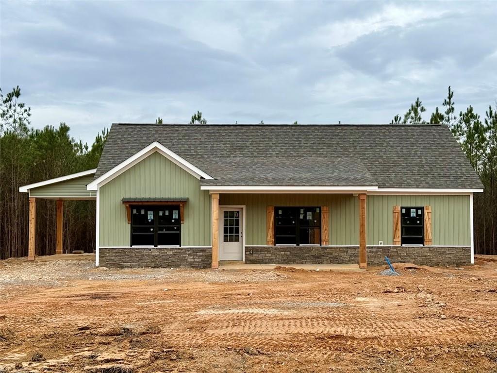 466 Mt Zion Church Road Tallapoosa, GA 30176 - Photo 5 of 42 a view of a house with many windows
