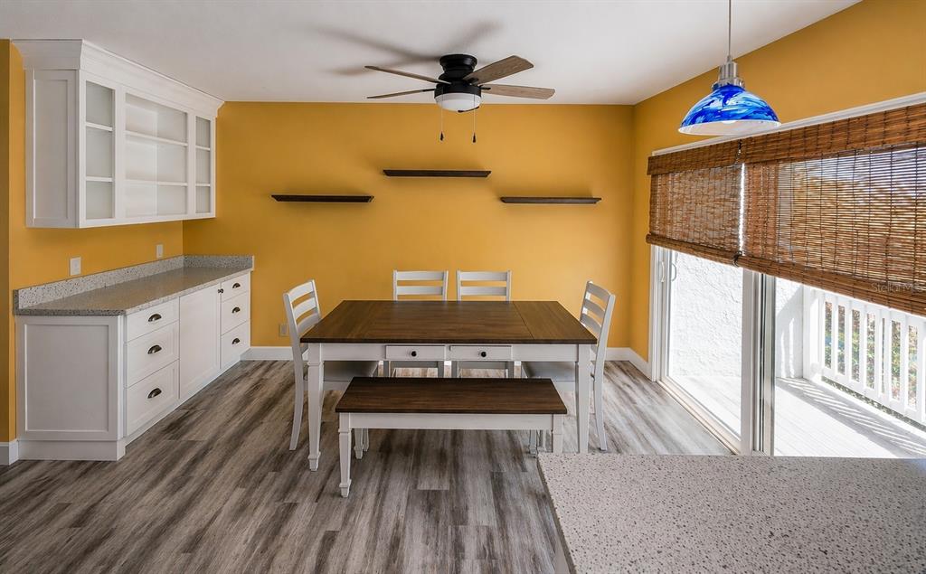 1244 Beachside Lane Indialantic, FL 32903 - Photo 13 of 25 a living room with a couch and a table