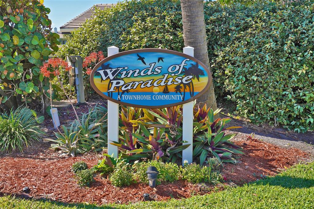 1244 Beachside Lane Indialantic, FL 32903 - Photo 22 of 25 a sign that is on a pole