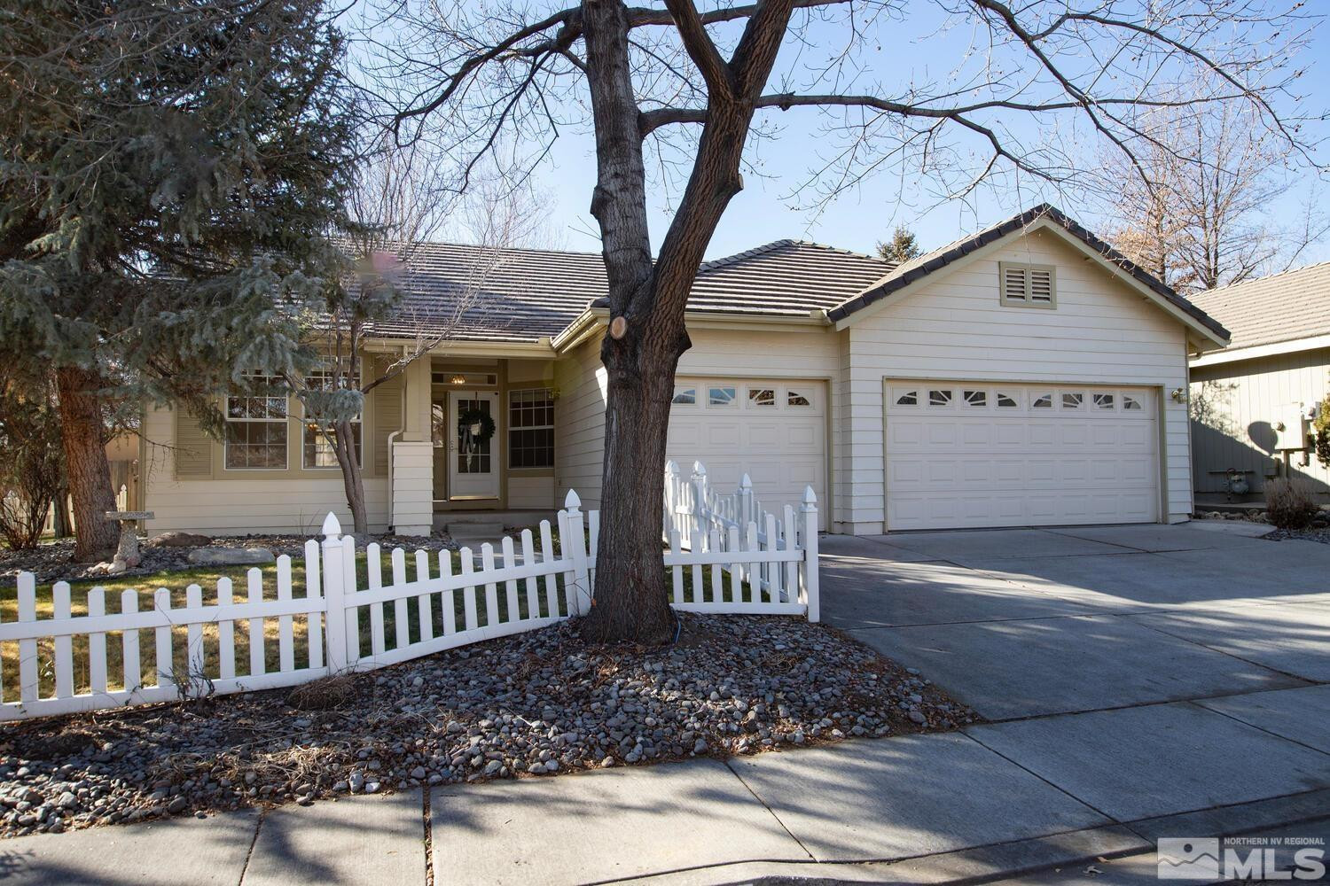 195 Riverbrook Court Reno, NV 89519 - Photo 1 of 40 a front view of a house with garden