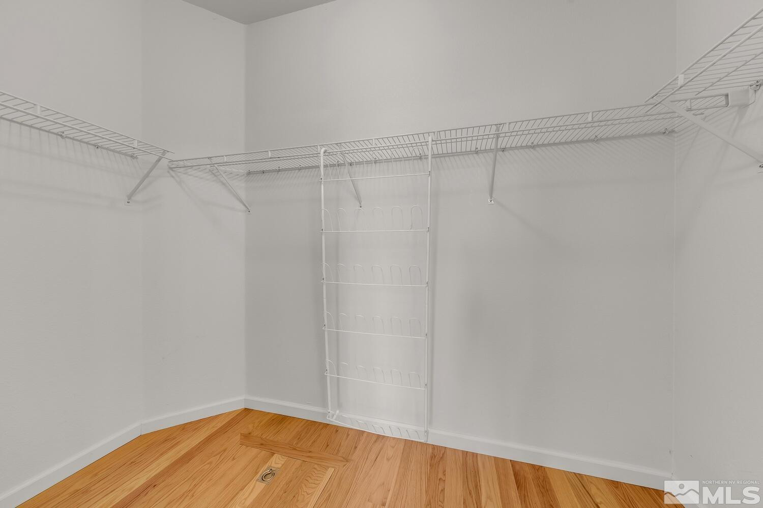 195 Riverbrook Court Reno, NV 89519 - Photo 26 of 40 a view of a room with wooden floor