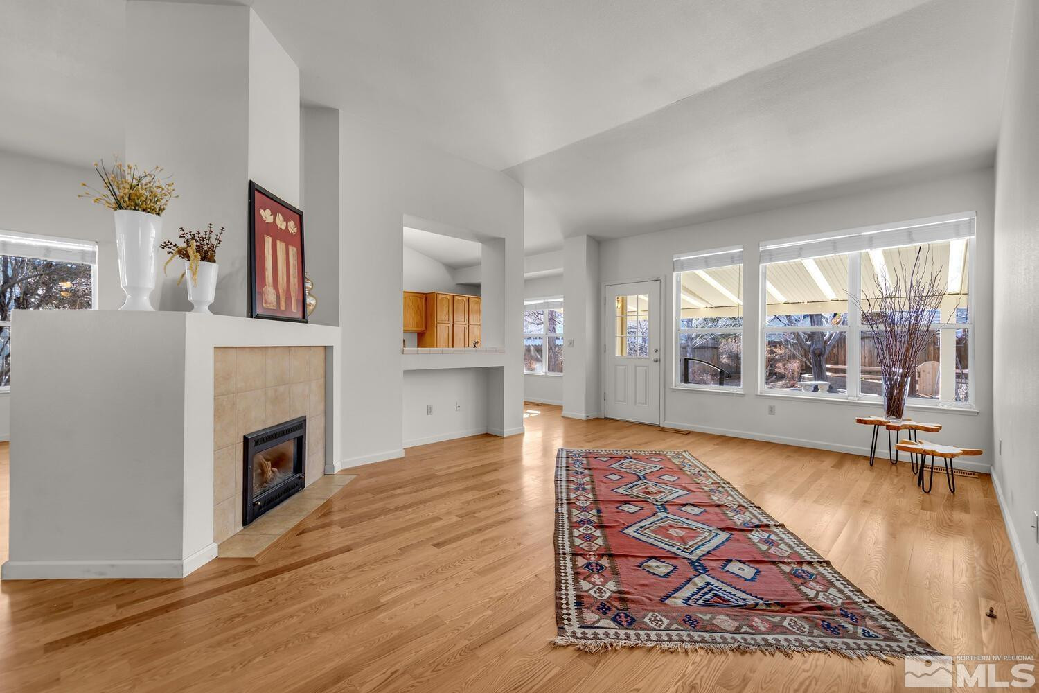 195 Riverbrook Court Reno, NV 89519 - Photo 8 of 40 a living room with furniture and a fireplace