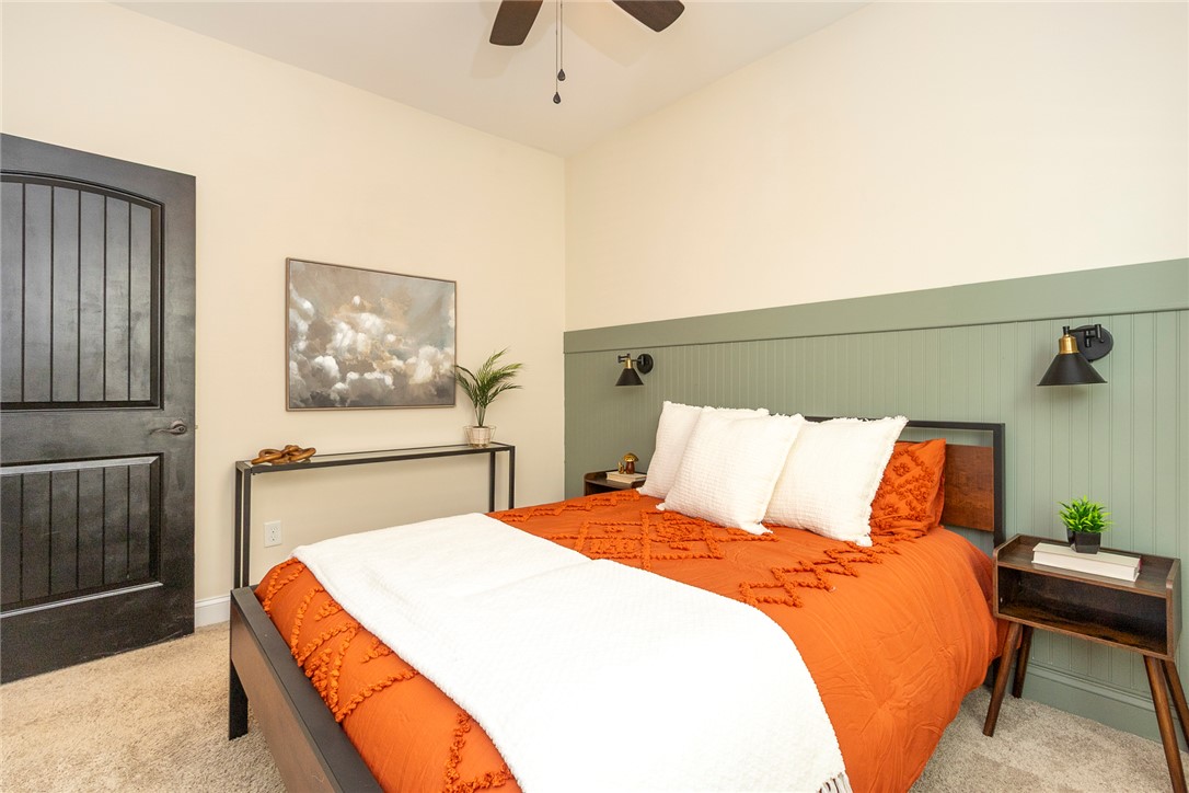 234 Streams Way Anderson, SC 29625 - Photo 21 of 44 This cozy bedroom offers comfort with a ceiling fan, enhancing the ambiance for restful living.