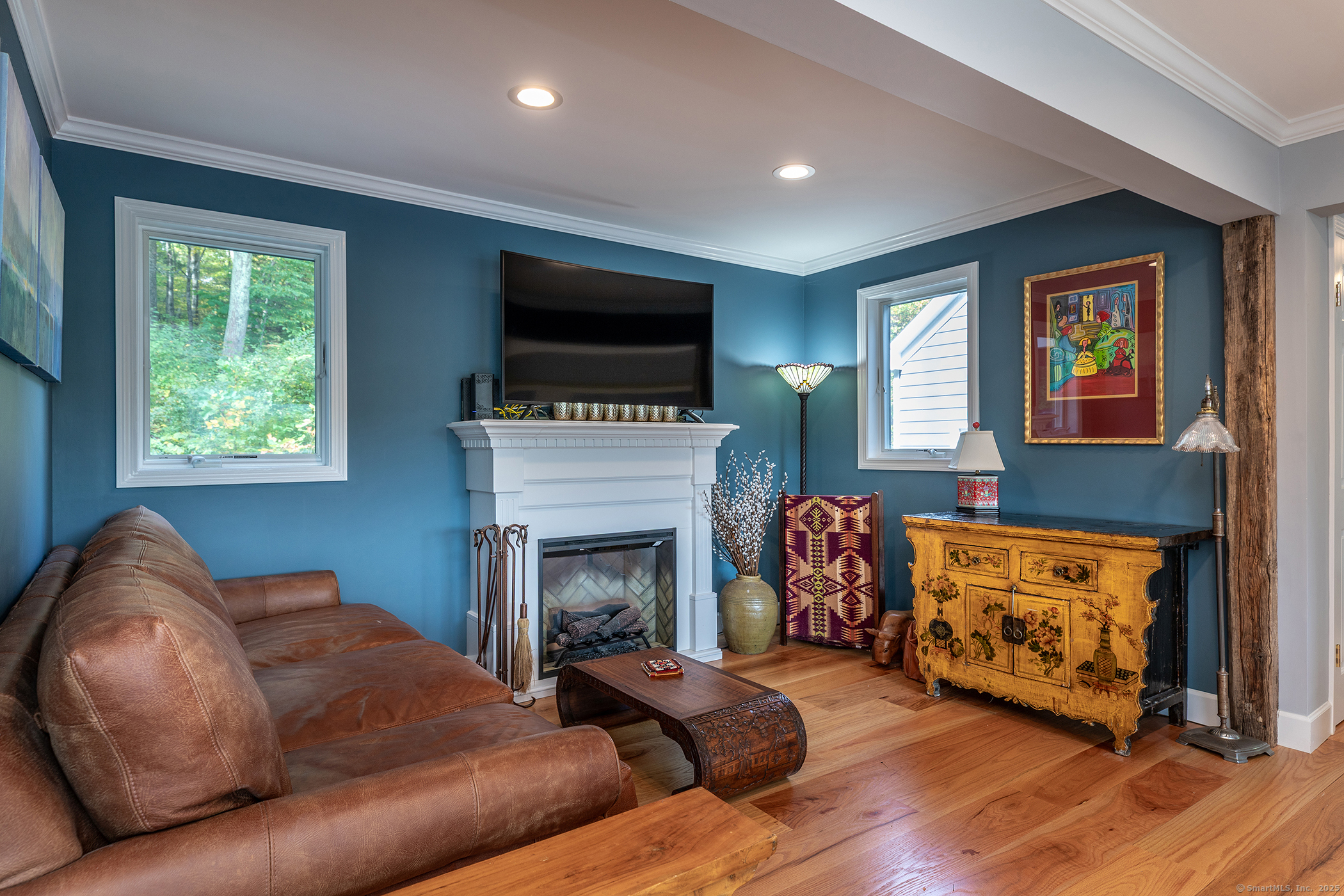168 Cobble Road Kent, CT 06757 - Photo 12 of 40 a living room with furniture fireplace and flat screen tv