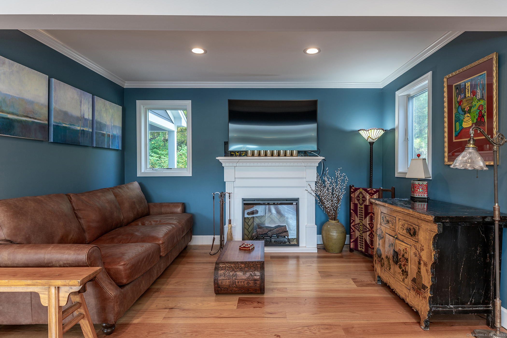 168 Cobble Road Kent, CT 06757 - Photo 13 of 40 a living room with furniture and a fireplace
