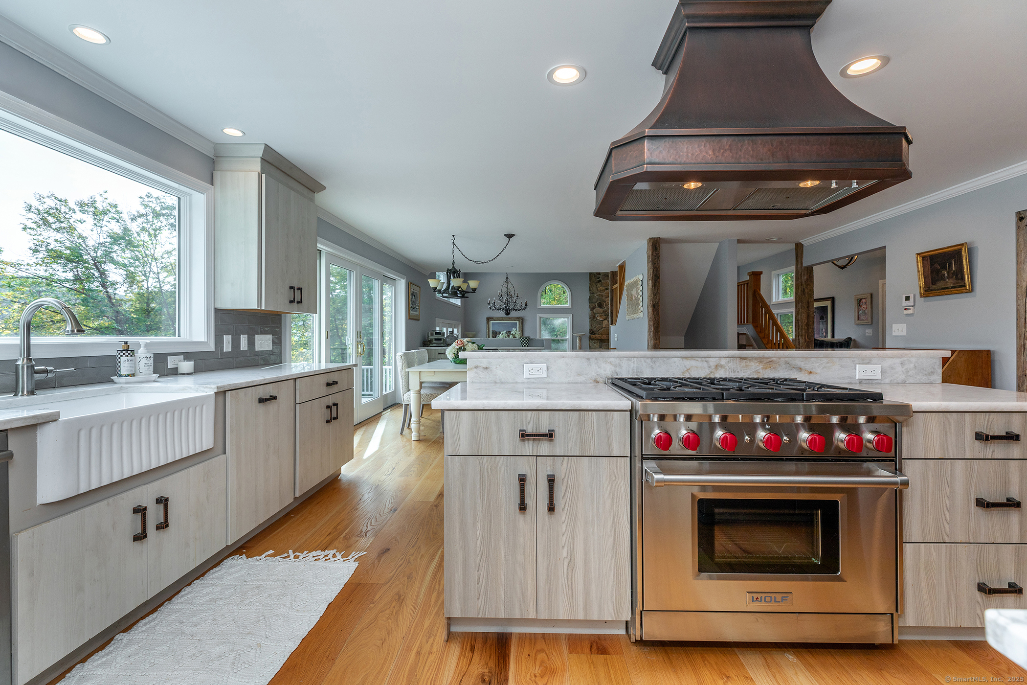 168 Cobble Road Kent, CT 06757 - Photo 14 of 40 a kitchen with a stove and cabinets