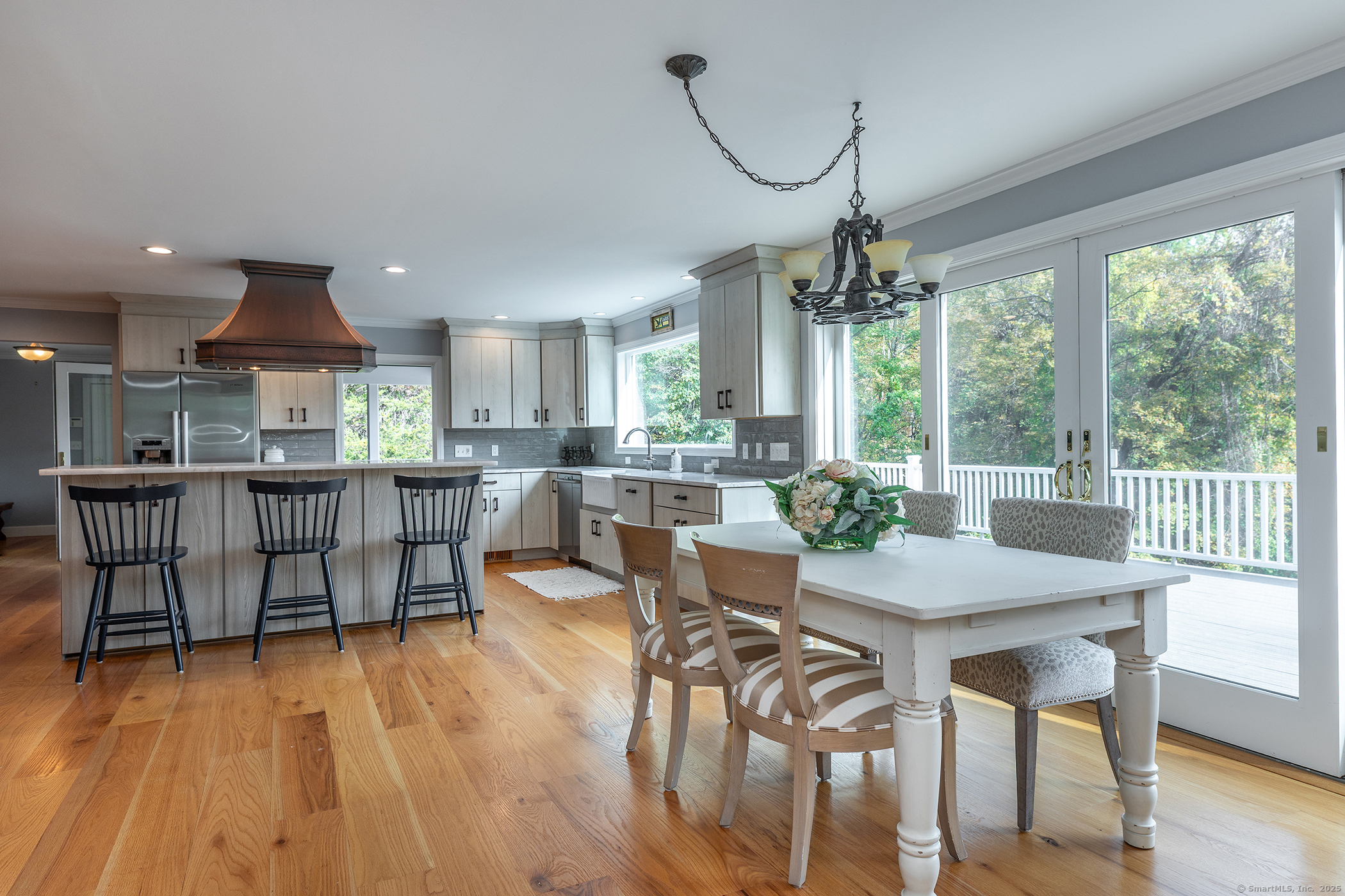 168 Cobble Road Kent, CT 06757 - Photo 15 of 40 a dining room with furniture window wooden floor