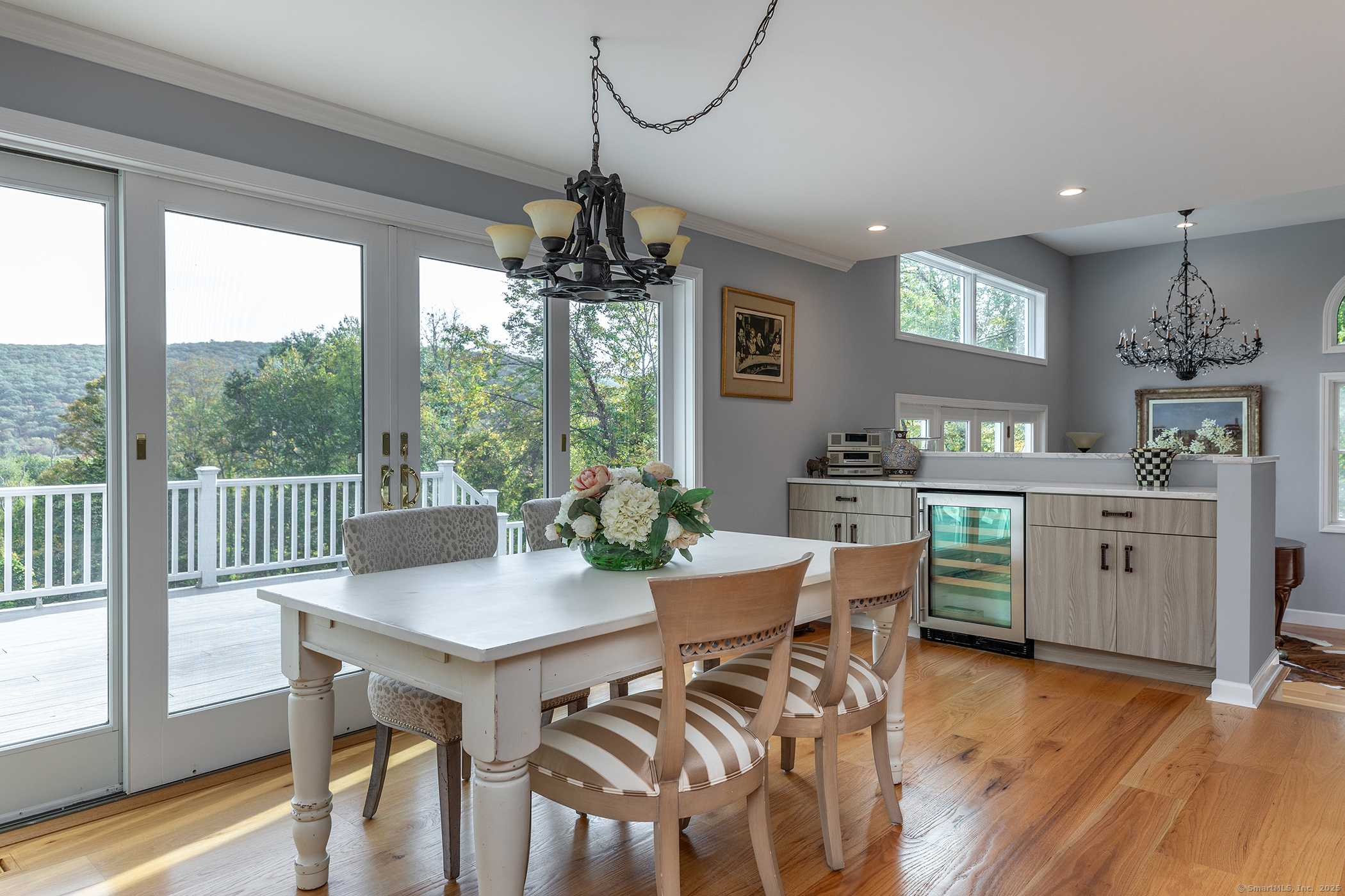 168 Cobble Road Kent, CT 06757 - Photo 16 of 40 a view of a dining room with furniture window and wooden floor