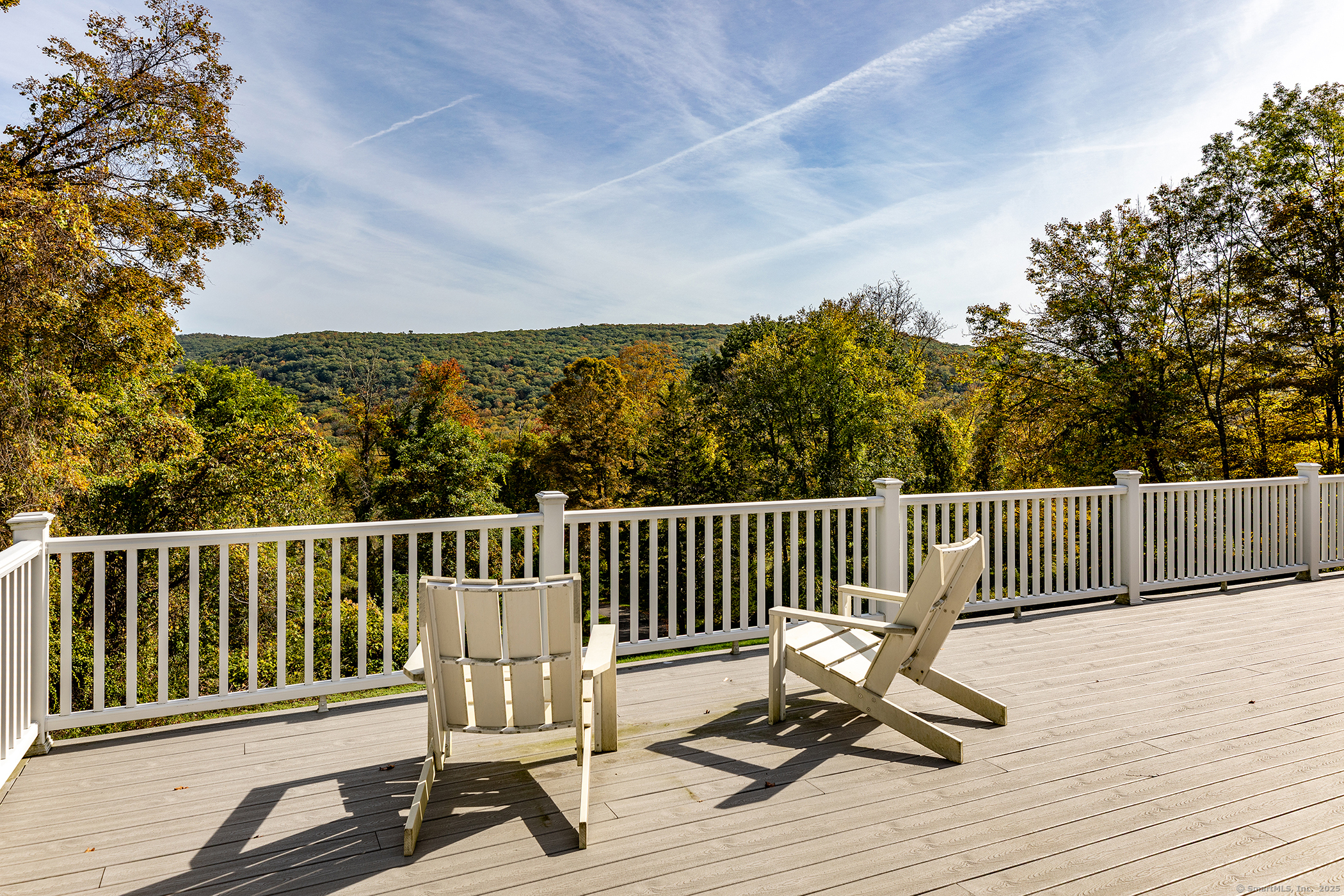 168 Cobble Road Kent, CT 06757 - Photo 17 of 40 a view of a chair and wooden floor