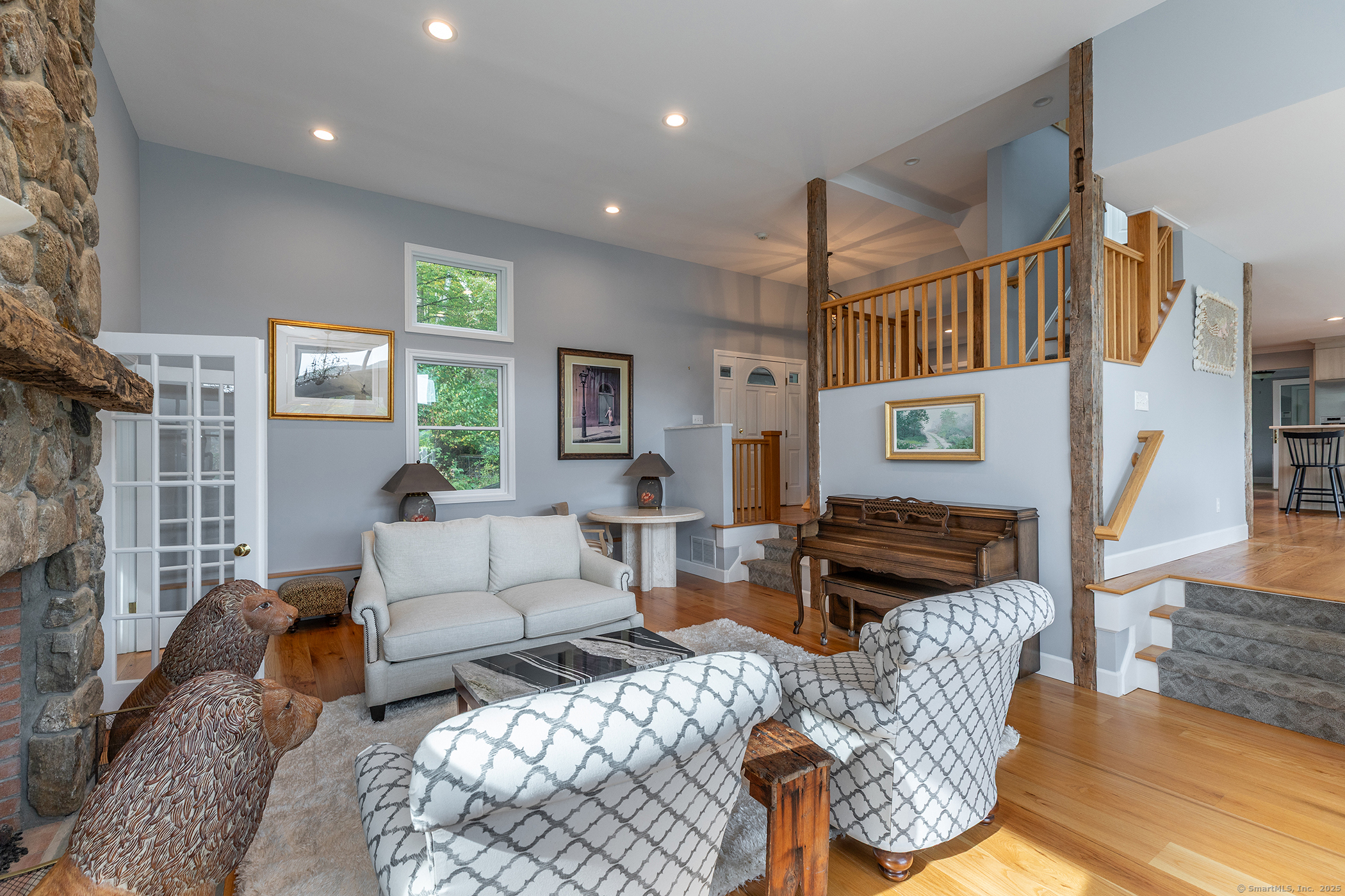 168 Cobble Road Kent, CT 06757 - Photo 23 of 40 a living room with furniture and a table