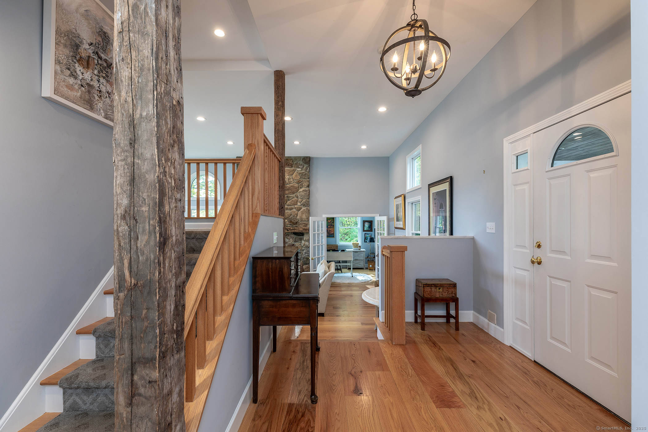 168 Cobble Road Kent, CT 06757 - Photo 26 of 40 a view of entryway livingroom and hall with wooden floor