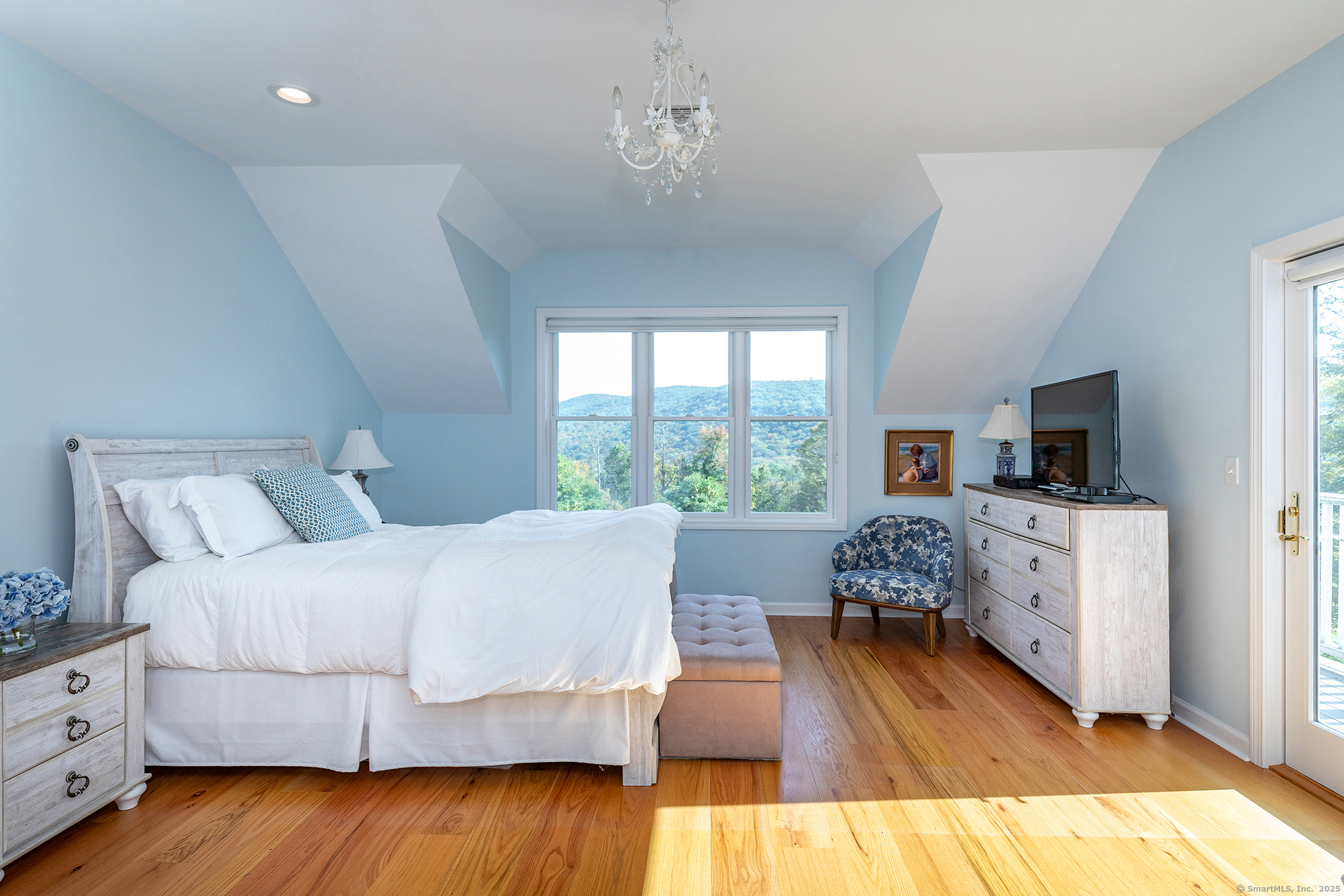 168 Cobble Road Kent, CT 06757 - Photo 28 of 40 a bedroom with a bed and a window