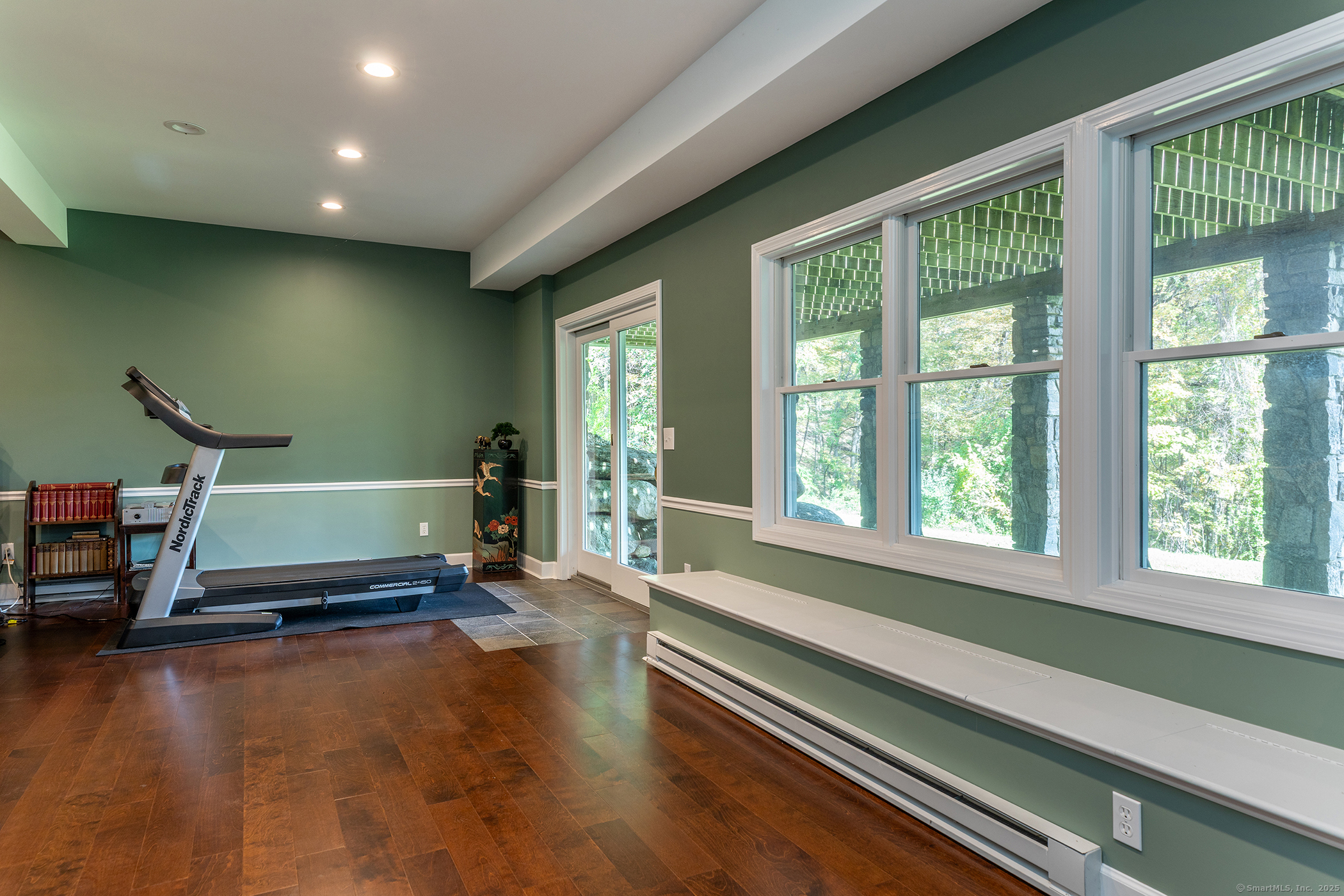 168 Cobble Road Kent, CT 06757 - Photo 36 of 40 a living room with furniture and a large window