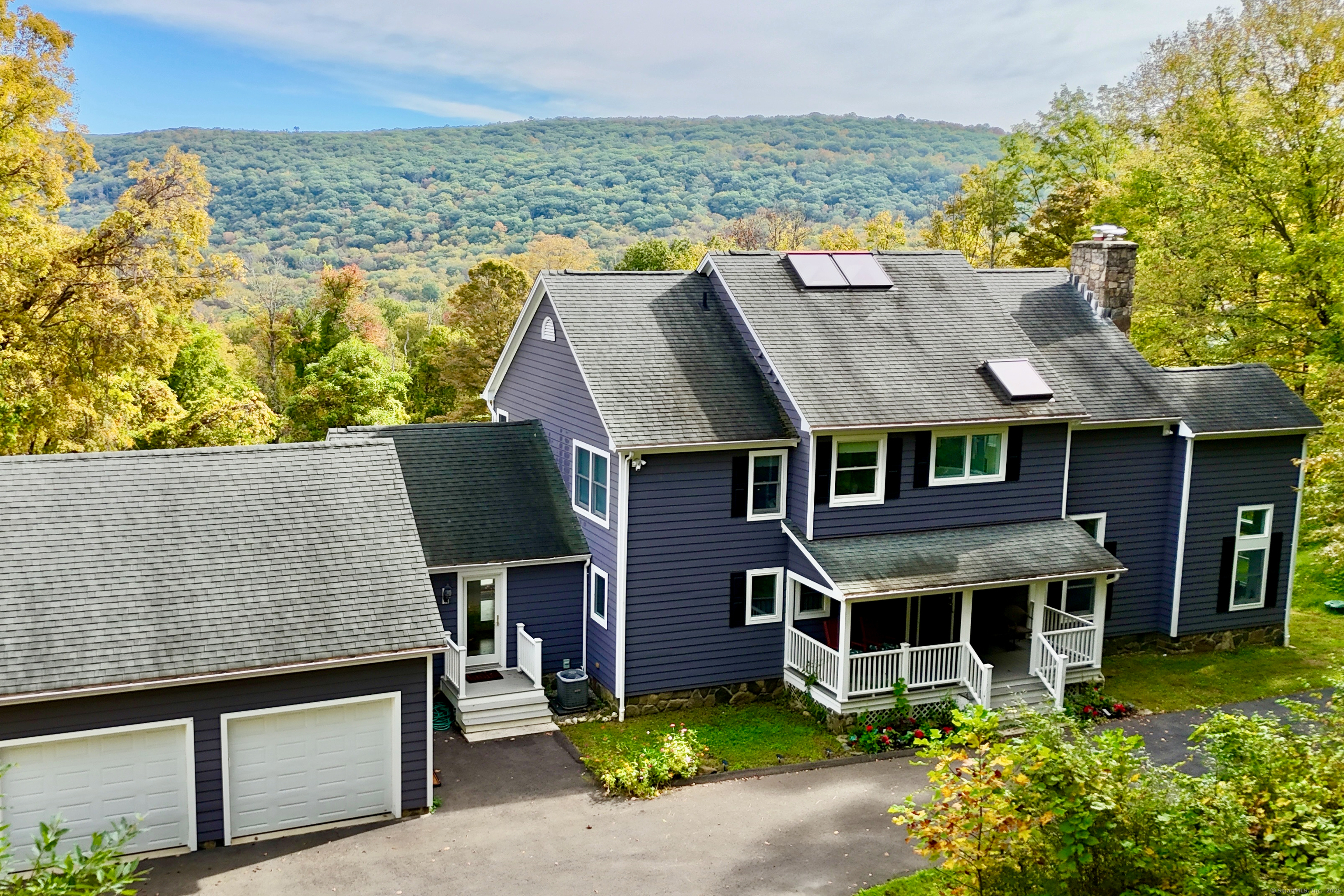 168 Cobble Road Kent, CT 06757 - Photo 40 of 40 an aerial view of a house with a garden and lake view