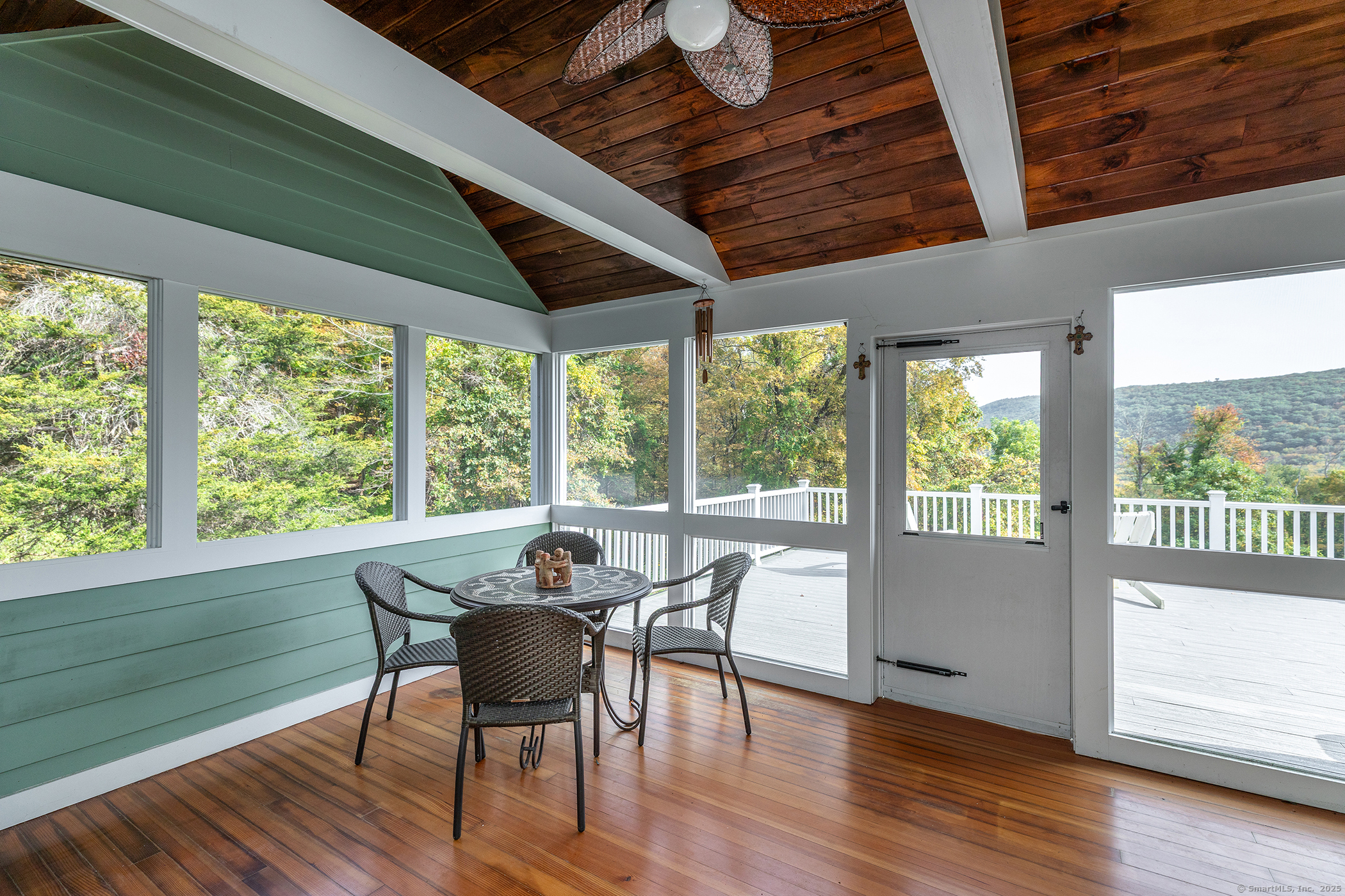 168 Cobble Road Kent, CT 06757 - Photo 9 of 40 a dining room with furniture and wooden floor