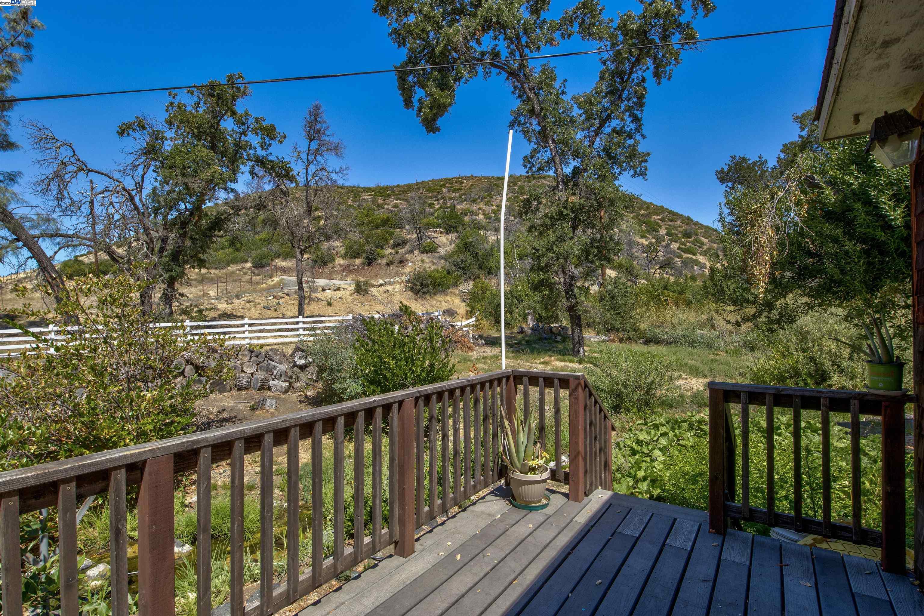 7878 Butts Canyon Road Pope Valley, CA 94567 - Photo 13 of 28 a view of a balcony with wooden floor