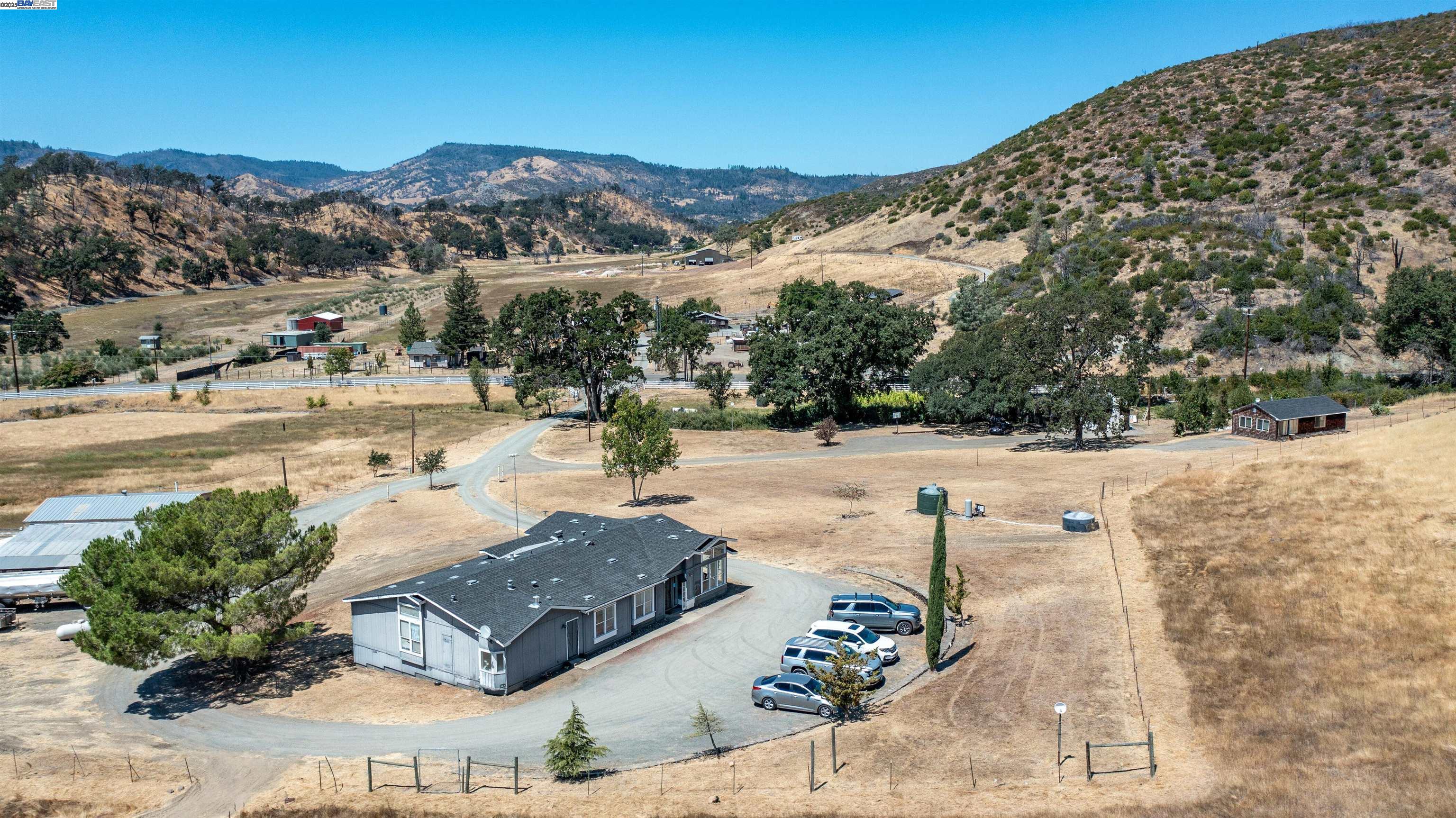7878 Butts Canyon Road Pope Valley, CA 94567 - Photo 19 of 28 a view of a backyard of the house