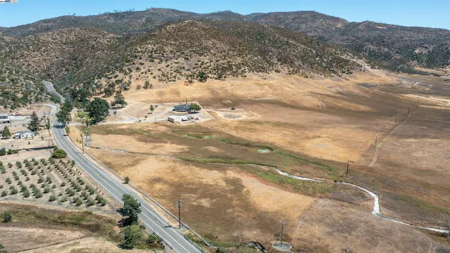 a view of a yard with mountain