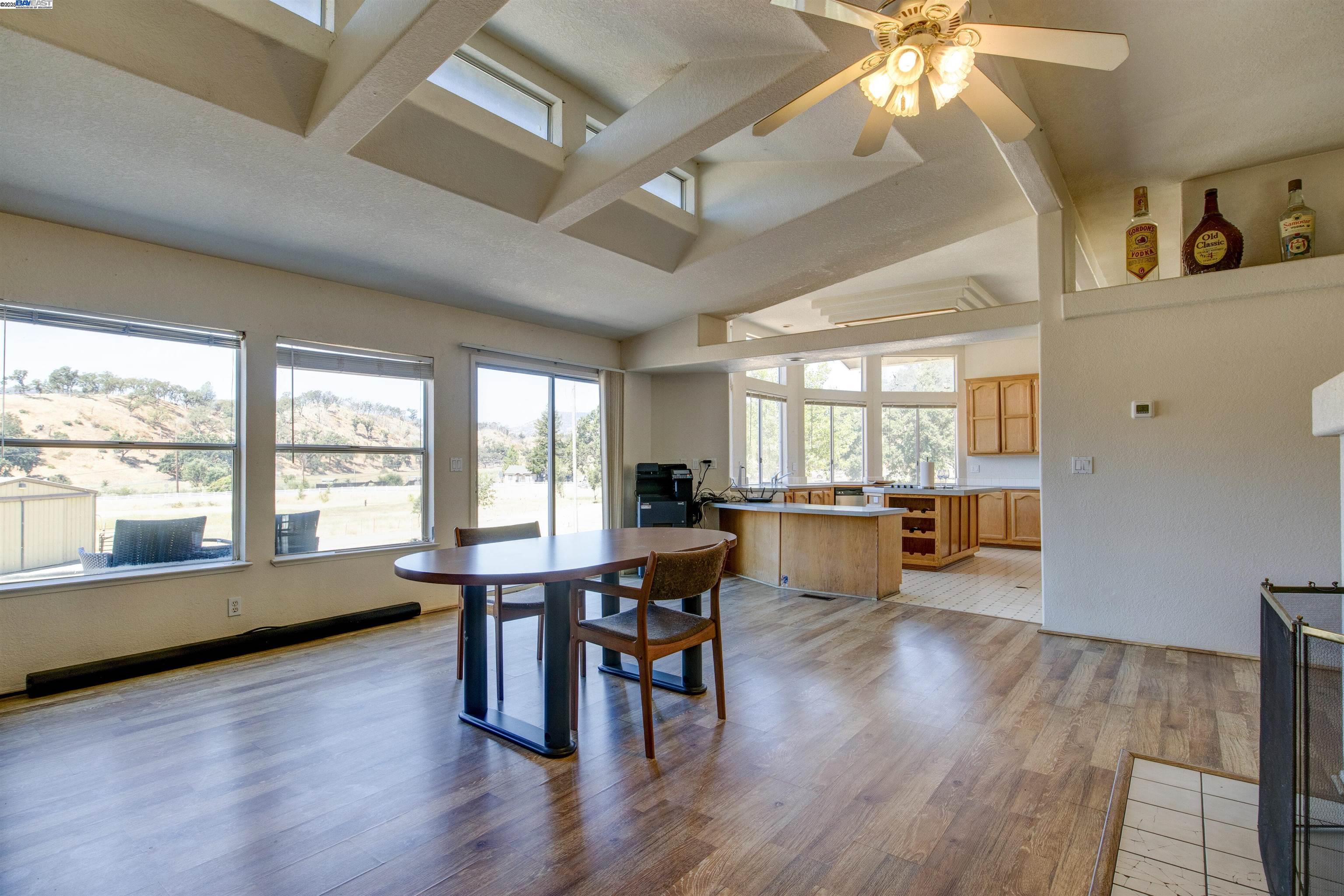 7878 Butts Canyon Road Pope Valley, CA 94567 - Photo 6 of 28 a view of a livingroom with furniture window and wooden floor