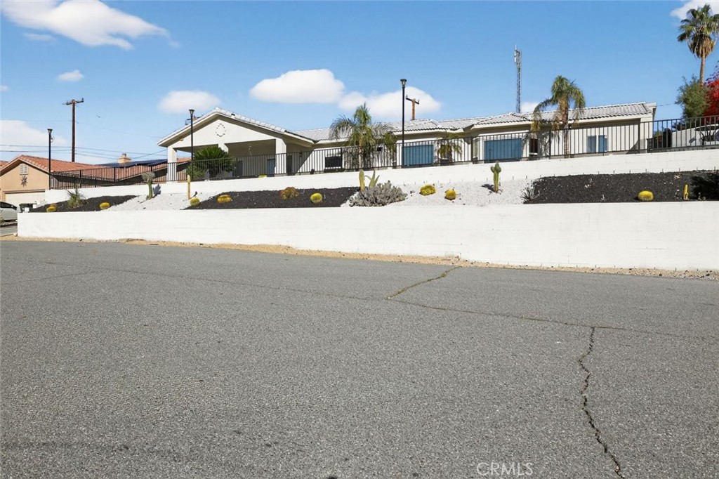 67972 Monterico Road Desert Hot Springs, CA 92240 - Photo 2 of 30 a view of a house with a snow on the road