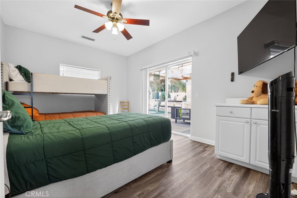 67972 Monterico Road Desert Hot Springs, CA 92240 - Photo 24 of 30 a bedroom with a bed and a dresser