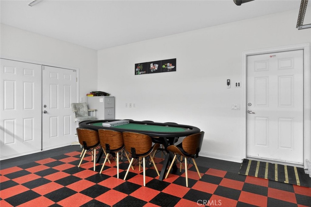 67972 Monterico Road Desert Hot Springs, CA 92240 - Photo 30 of 30 a view of a workspace with furniture and wooden floor