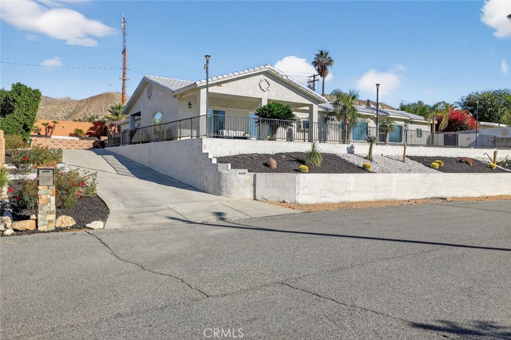 67972 Monterico Road Desert Hot Springs, CA 92240 - Photo 3 of 30 a view of a house with a park