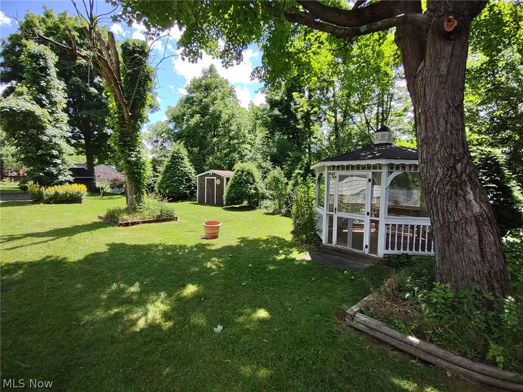 595 Barrett Road Berea, OH 44017 - Photo 10 of 18 View of yard featuring a storage unit and a gazebo
