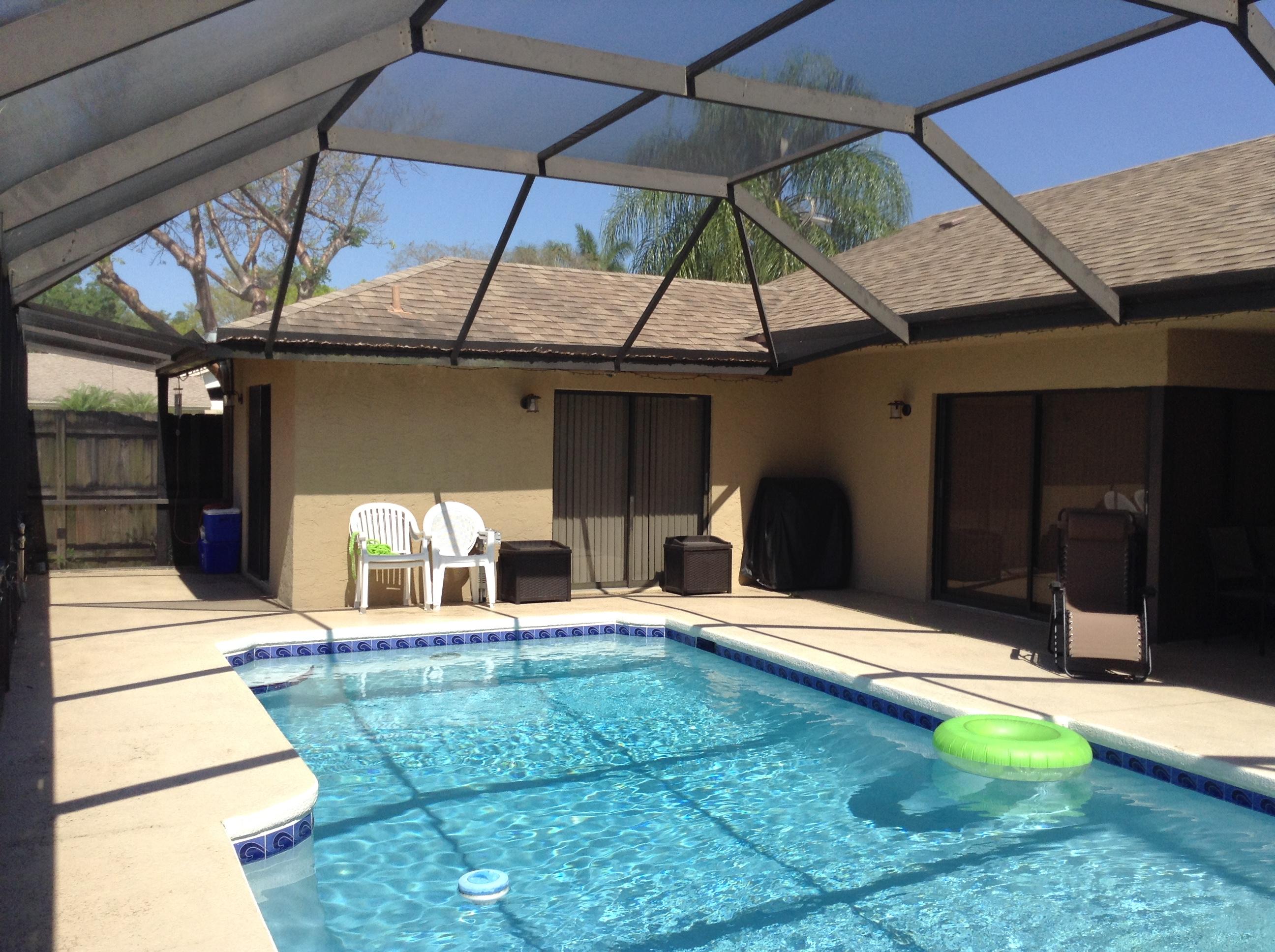 11710 Springflower Place Boca Raton, FL 33428 - Photo 1 of 10 screened pool area