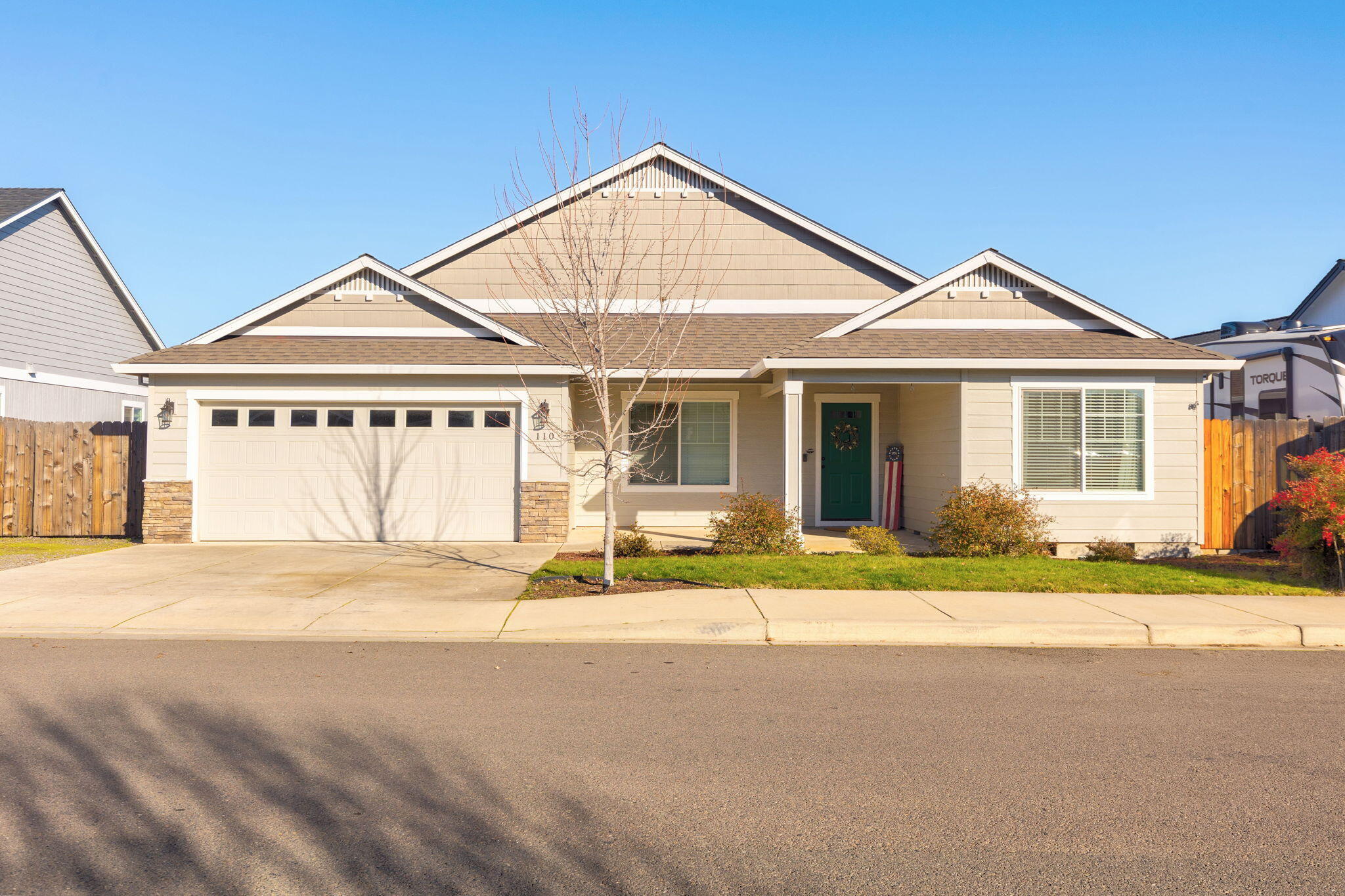 110 Linton Way Eagle Point, OR 97524 - Photo 1 of 41 a front view of a house with a yard