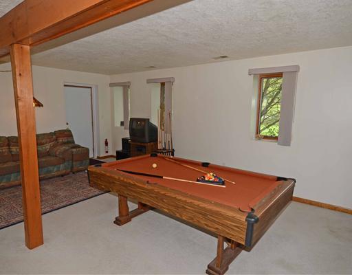 221 Monks Road Valencia, PA 16059 - Photo 12 of 18 Family Room. Bright family room, lots of windows, neutral carpet, pool table stays.