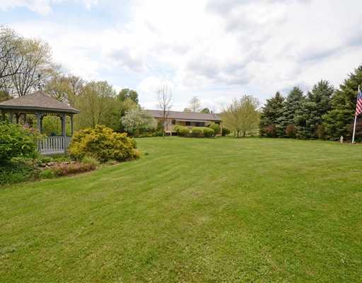 221 Monks Road Valencia, PA 16059 - Photo 17 of 18 Land. Large level professionally landscaped fenced rear yard.