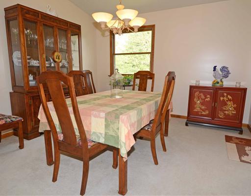 221 Monks Road Valencia, PA 16059 - Photo 5 of 18 Dining Room. Large dining room with neutral carpet, vaulted ceiling.
