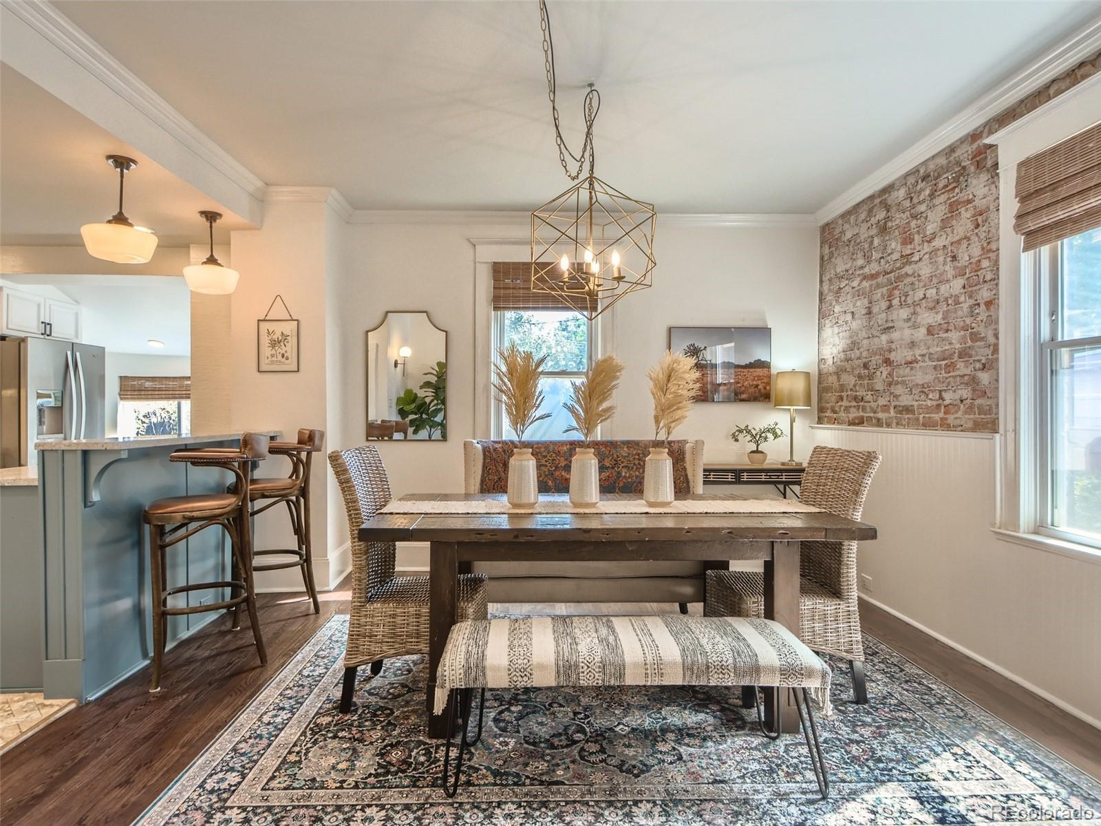2958 Hooker Street Denver, CO 80211 - Photo 11 of 40 a view of a dining room with furniture window and wooden floor