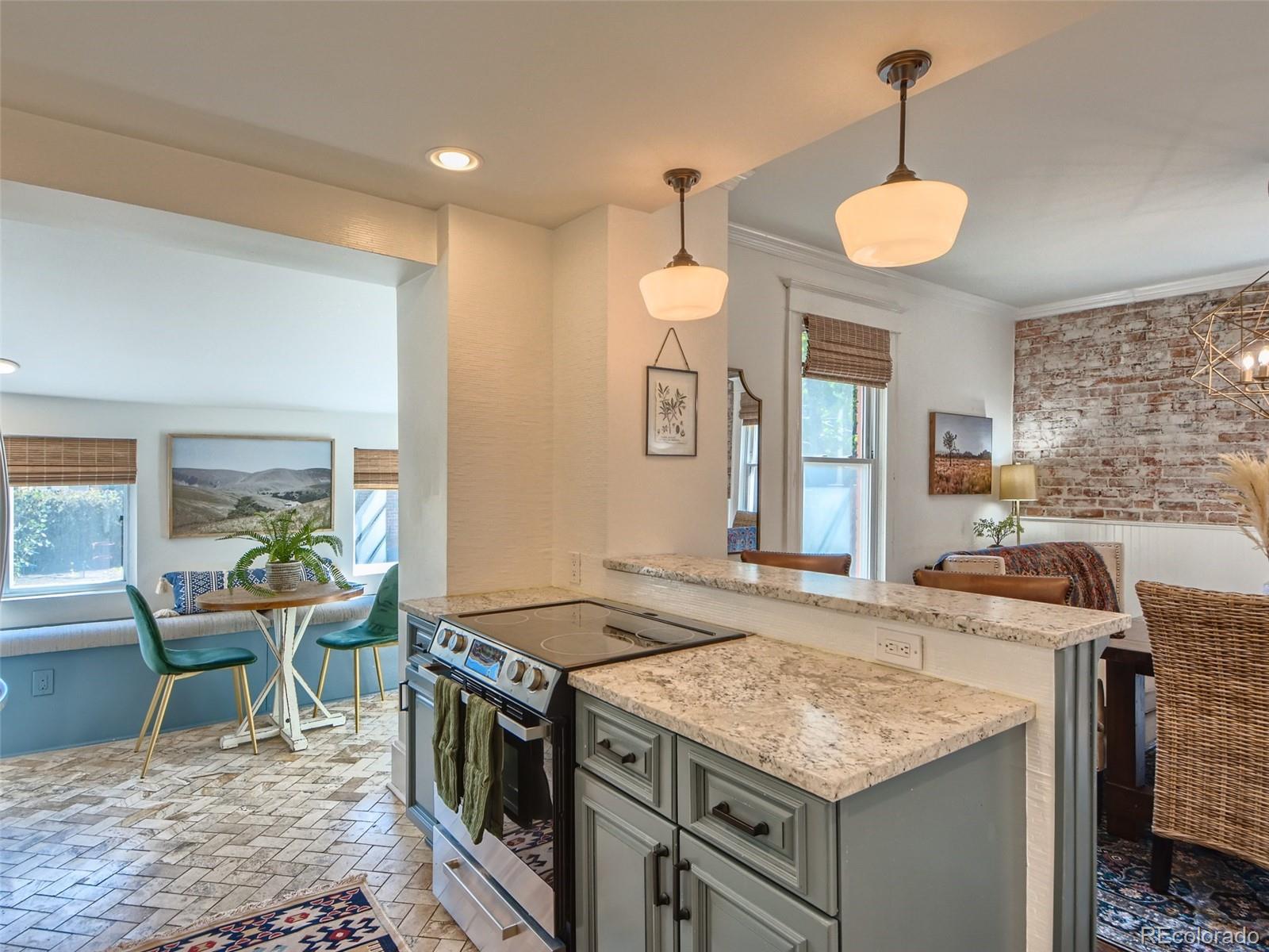 2958 Hooker Street Denver, CO 80211 - Photo 13 of 40 a kitchen with a stove and a wooden floors