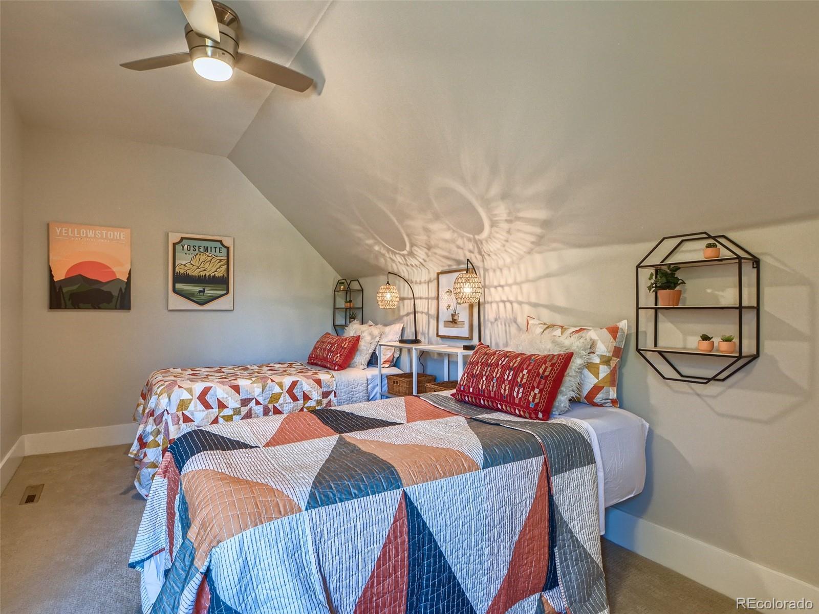 2958 Hooker Street Denver, CO 80211 - Photo 19 of 40 a bedroom with furniture and wooden floor