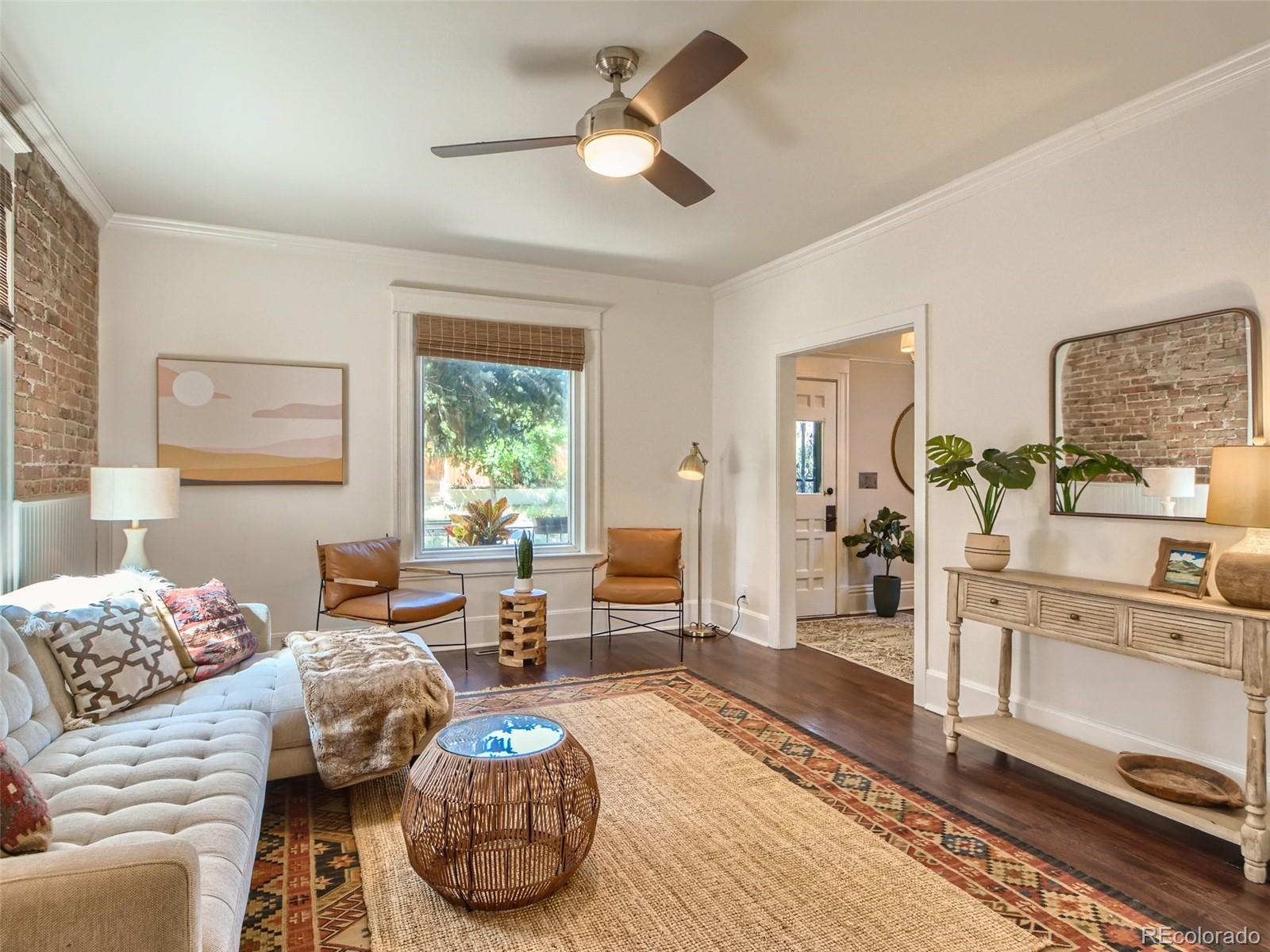 2958 Hooker Street Denver, CO 80211 - Photo 2 of 40 a bedroom with furniture and a window