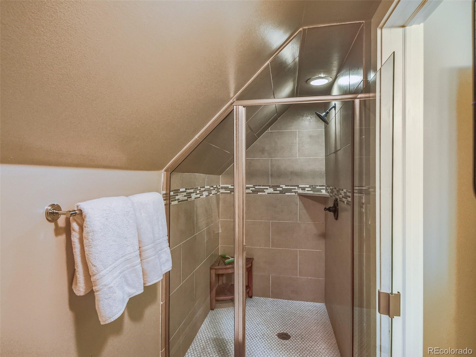 2958 Hooker Street Denver, CO 80211 - Photo 25 of 40 a bathroom with a shower