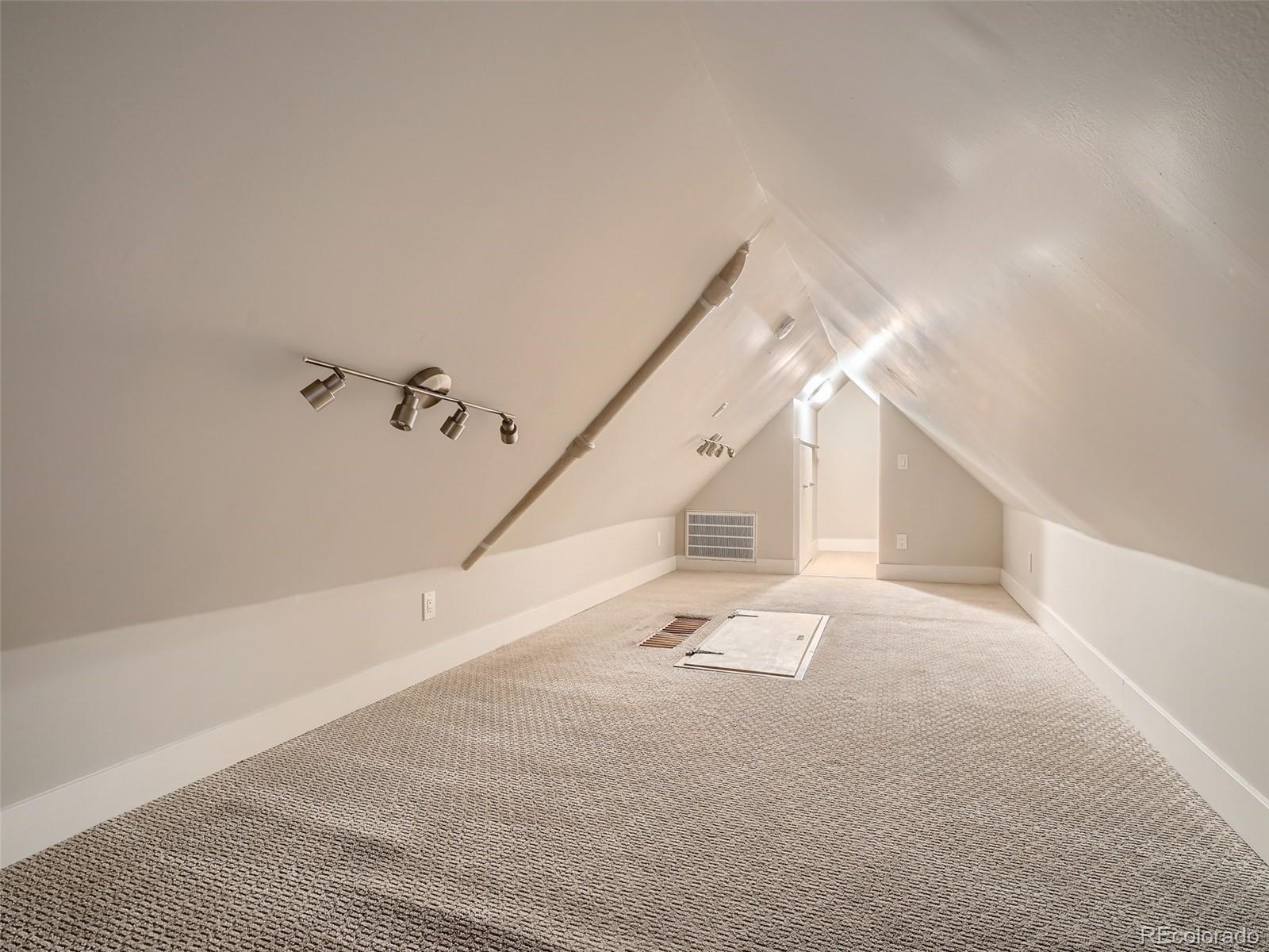 2958 Hooker Street Denver, CO 80211 - Photo 26 of 40 a view of an empty room with stairs