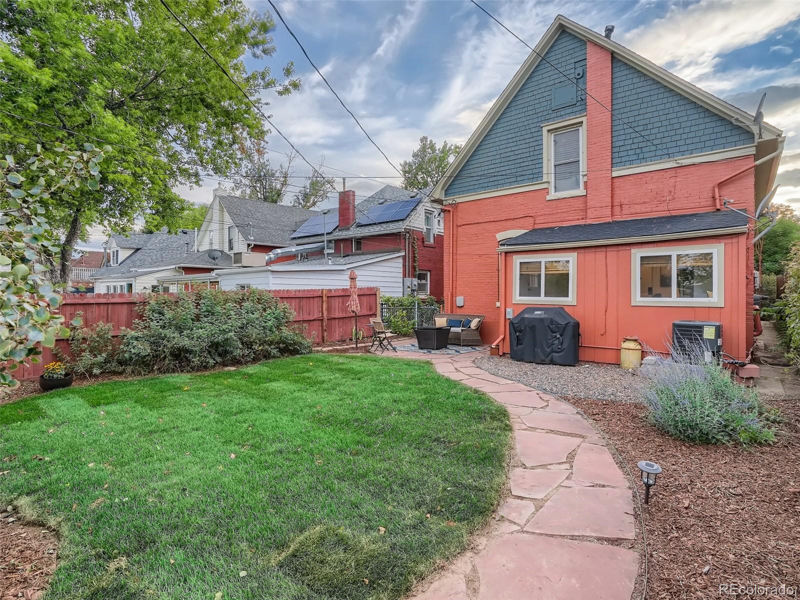 2958 Hooker Street Denver, CO 80211 - Photo 29 of 40 a front view of a house with garden