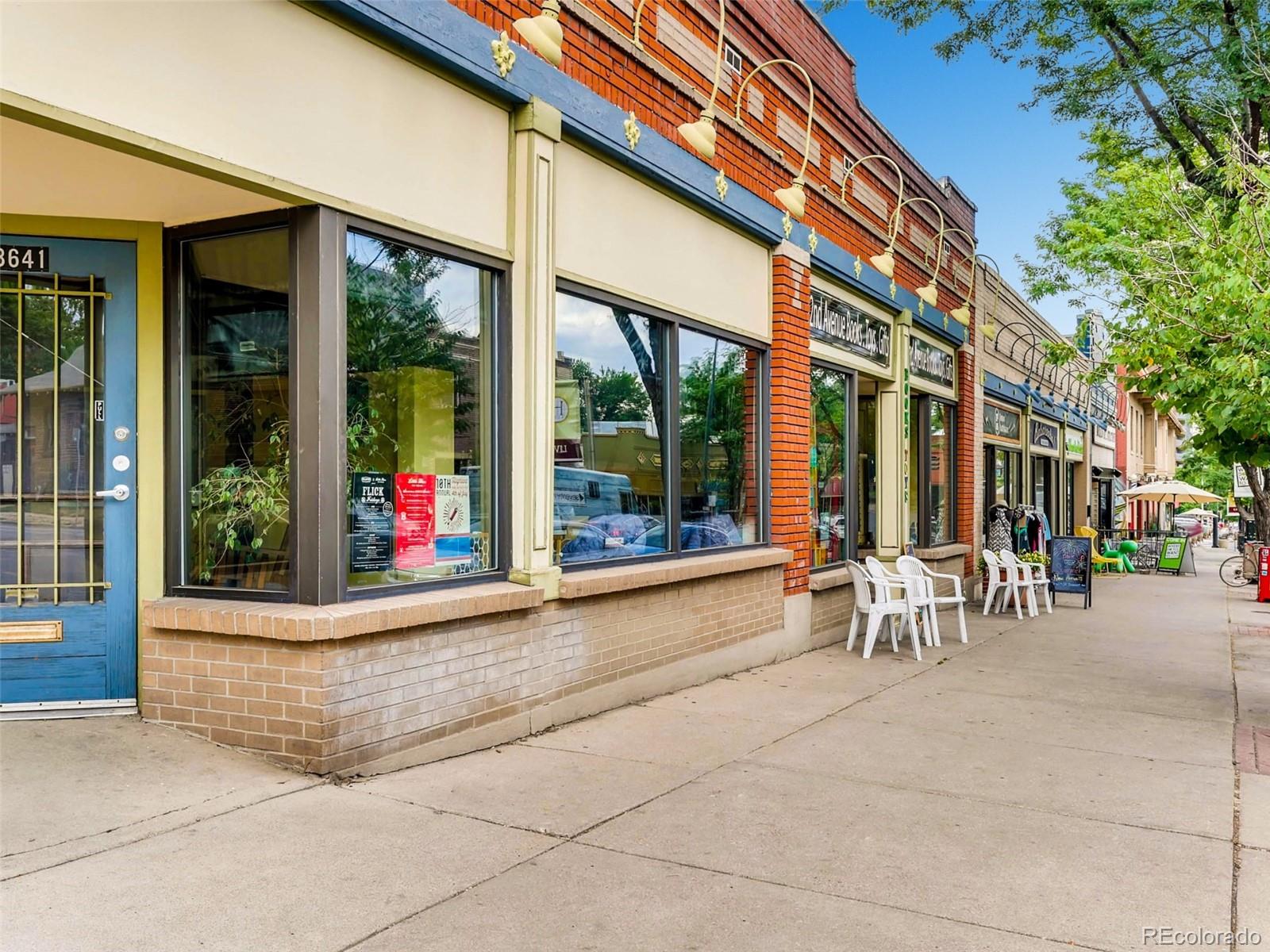 2958 Hooker Street Denver, CO 80211 - Photo 33 of 40 a view of a building with sitting area and glass windows