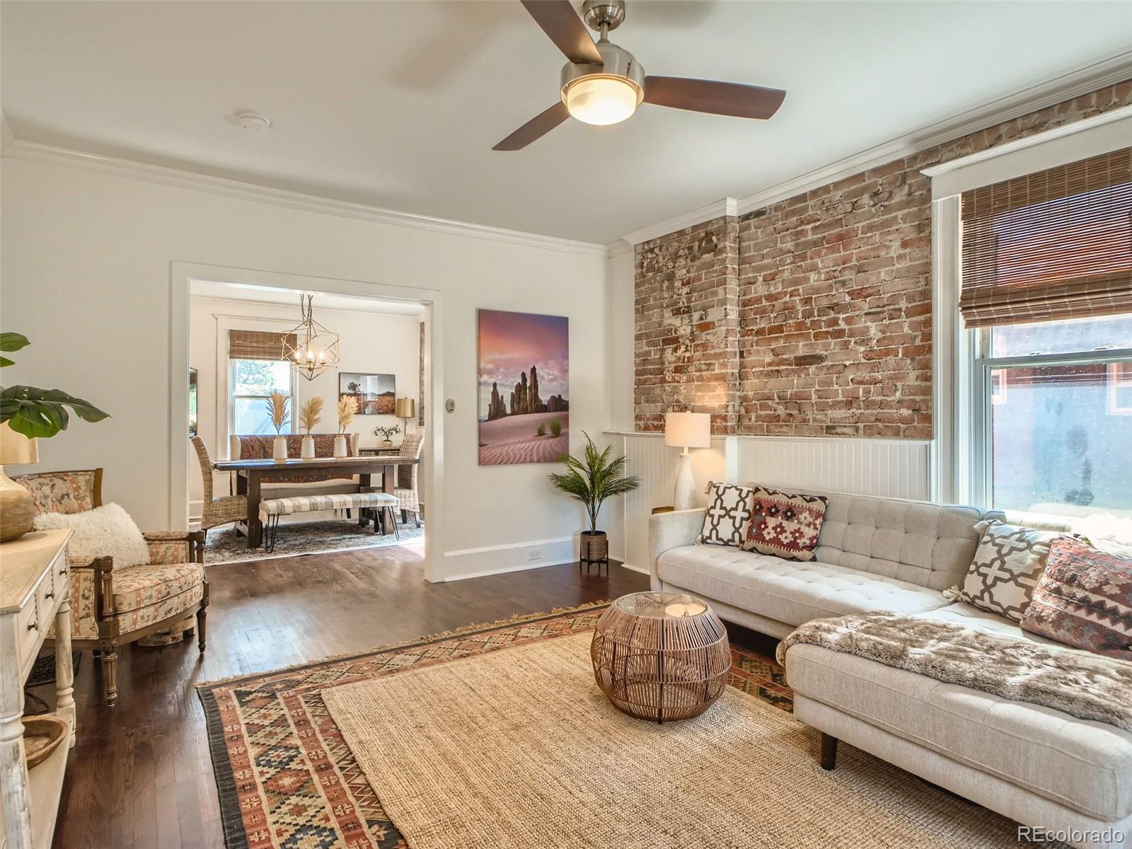 2958 Hooker Street Denver, CO 80211 - Photo 6 of 40 a living room with furniture and a couch