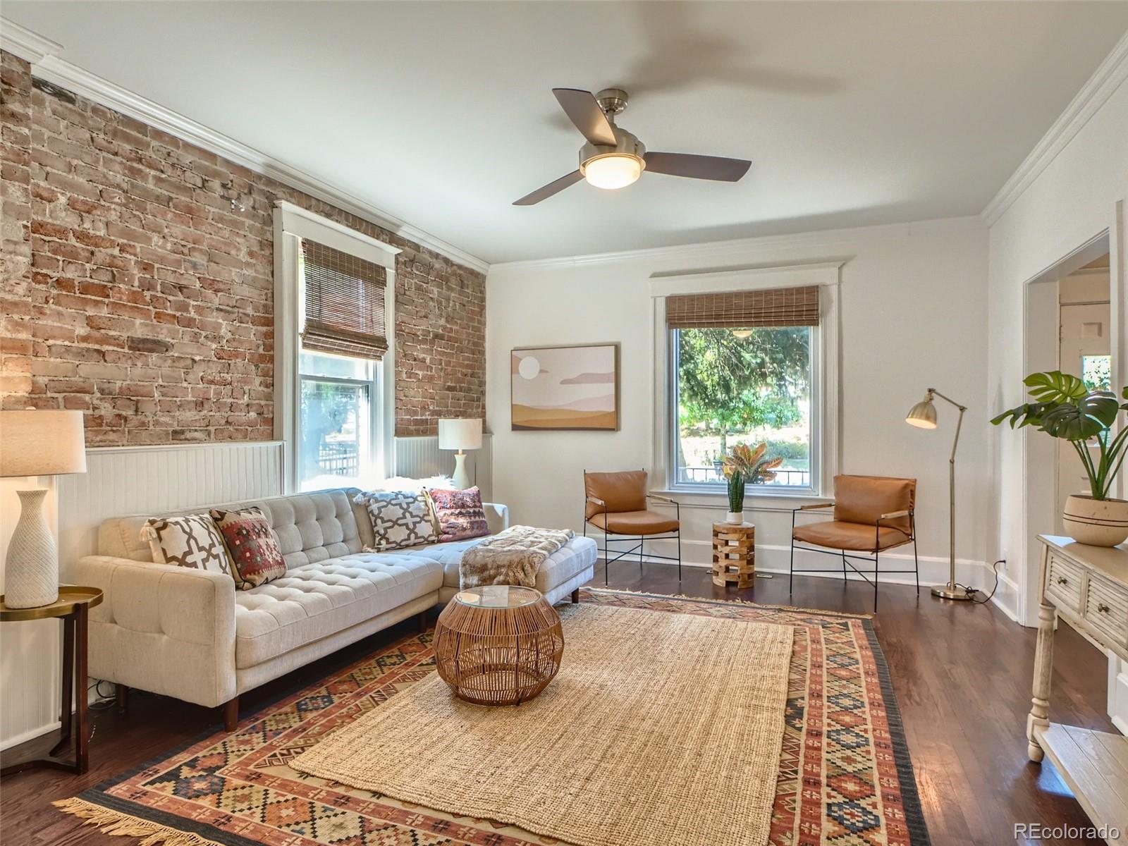 2958 Hooker Street Denver, CO 80211 - Photo 7 of 40 a living room with furniture and a large window