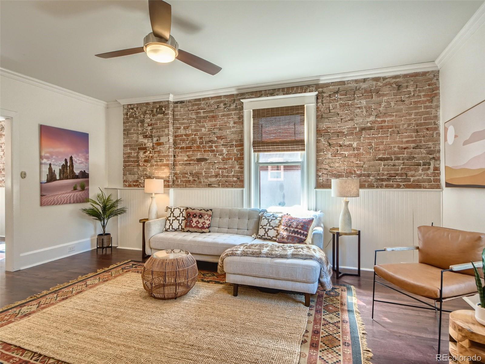 2958 Hooker Street Denver, CO 80211 - Photo 9 of 40 a living room with furniture and a large window