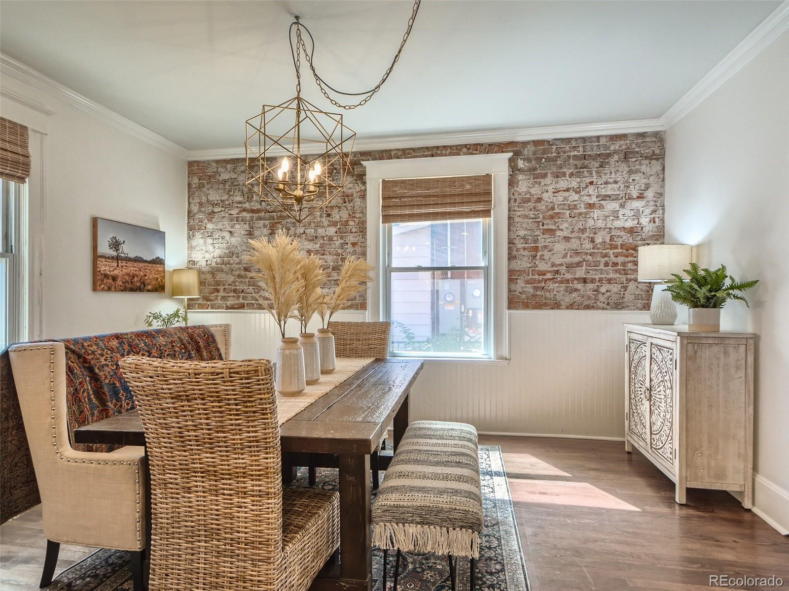 2958 Hooker Street Denver, CO 80211 - Photo 10 of 40 a view of a dining room with furniture window and wooden floor
