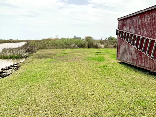 a view of a yard with an outdoor space
