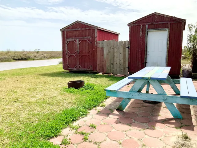 a view of swimming pool with a yard