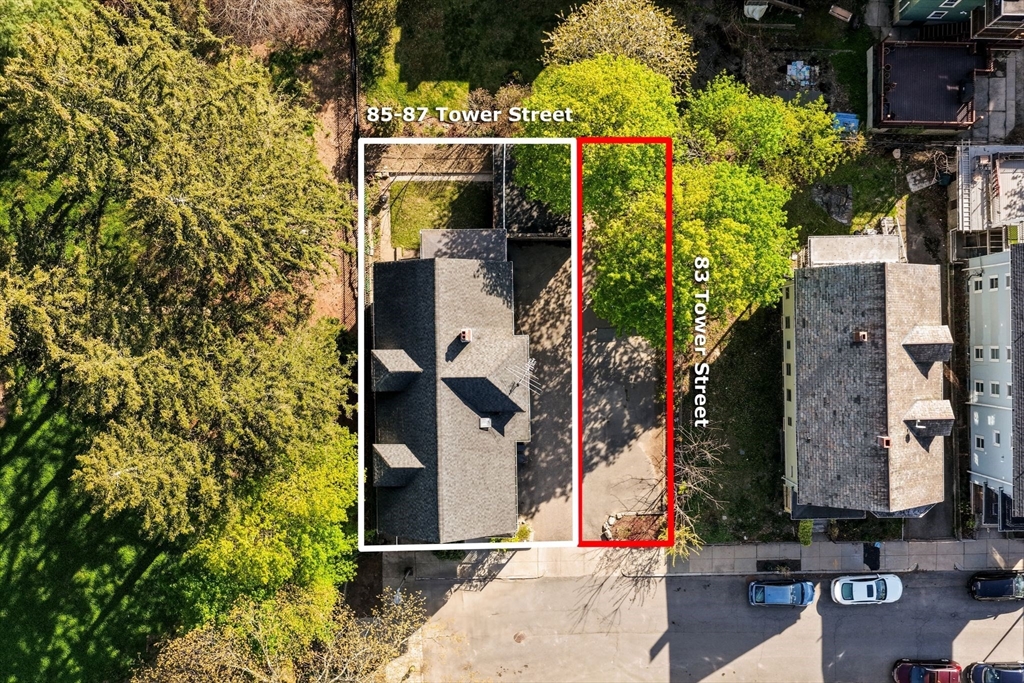 83 Tower Street Boston, MA 02130 - Photo 1 of 10 front view of a house with a street