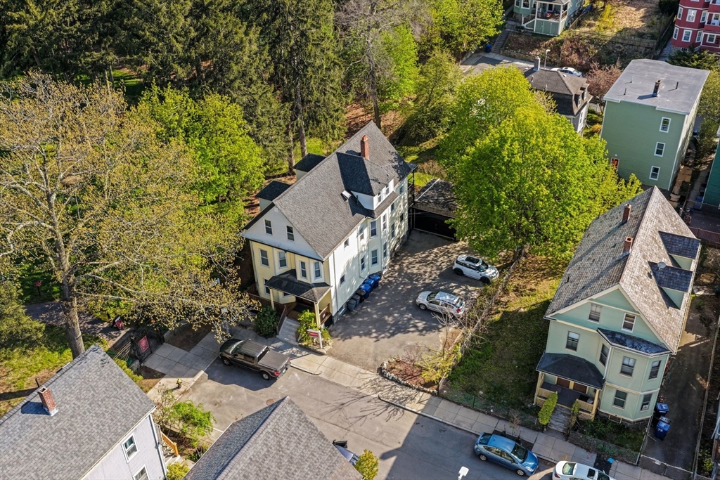 83 Tower Street Boston, MA 02130 - Photo 2 of 10 an aerial view of a house with yard