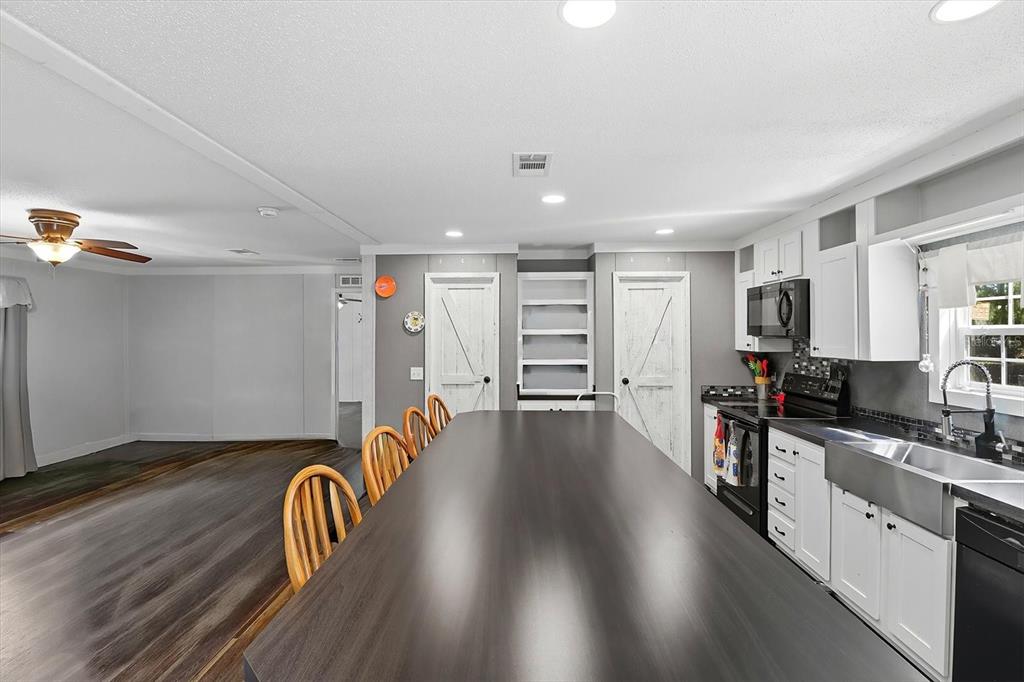 4801 North Mattox Point Crystal River, FL 34428 - Photo 15 of 46 a view of living room with furniture and wooden floor